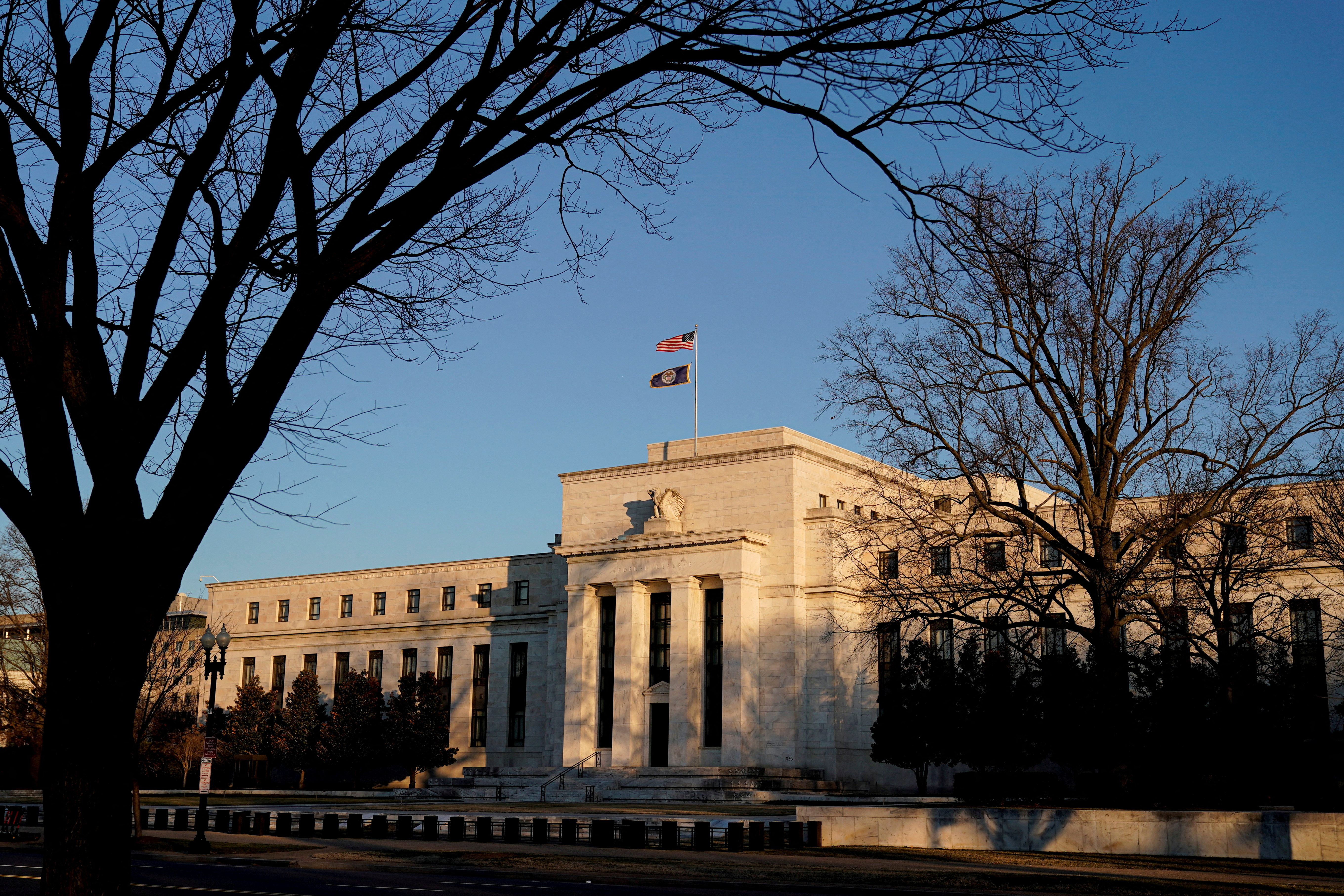 FILE PHOTO: The Federal Reserve building is seen before the Federal Reserve board is expected to signal plans to raise interest rates in March as it focuses on fighting inflation in Washington, U.S., January 26, 2022. REUTERS/Joshua Roberts/File Photo