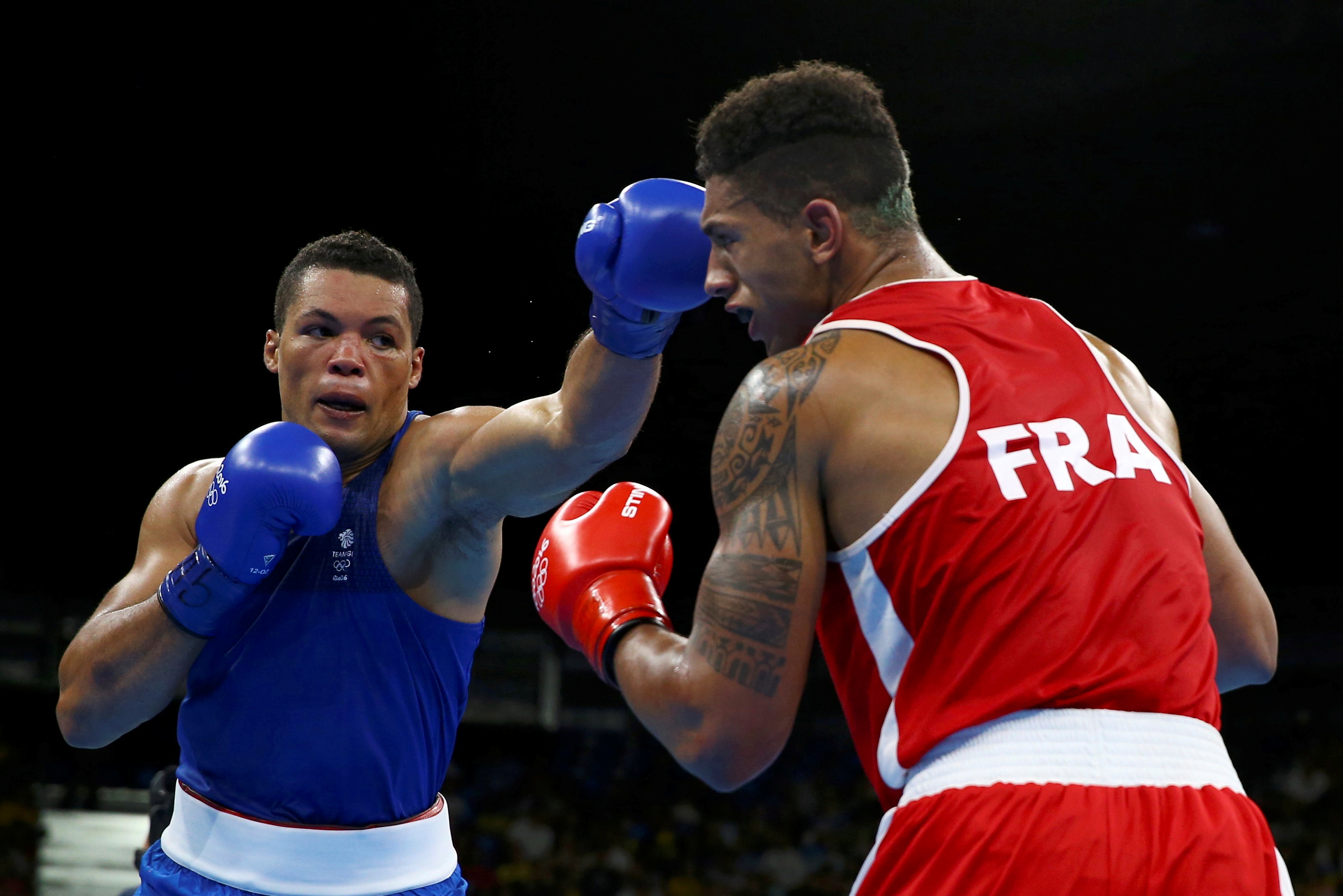 FILE PHOTO: 2016 Rio Olympics - Boxing - Final - Men's Super Heavy (+91kg) Final Bout 273 - Riocentro - Pavilion 6 - Rio de Janeiro, Brazil - 21/08/2016. Tony Yoka (FRA) of France and Joseph Joyce (GBR) of Britain compete. REUTERS/Peter Cziborra FOR EDITORIAL USE ONLY. NOT FOR SALE FOR MARKETING OR ADVERTISING CAMPAIGNS./File Photo