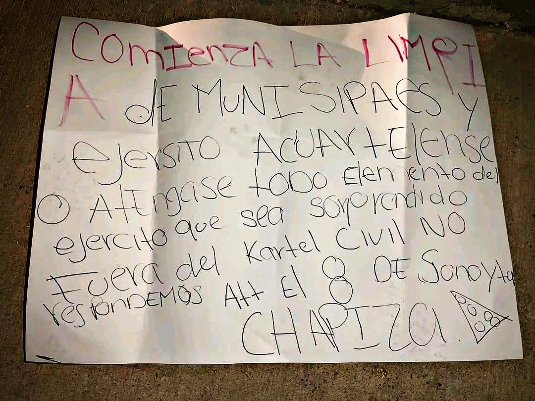 A cardboard signed by La Chapiza made threats against the military and was found in November (@Calvarie_Locus)