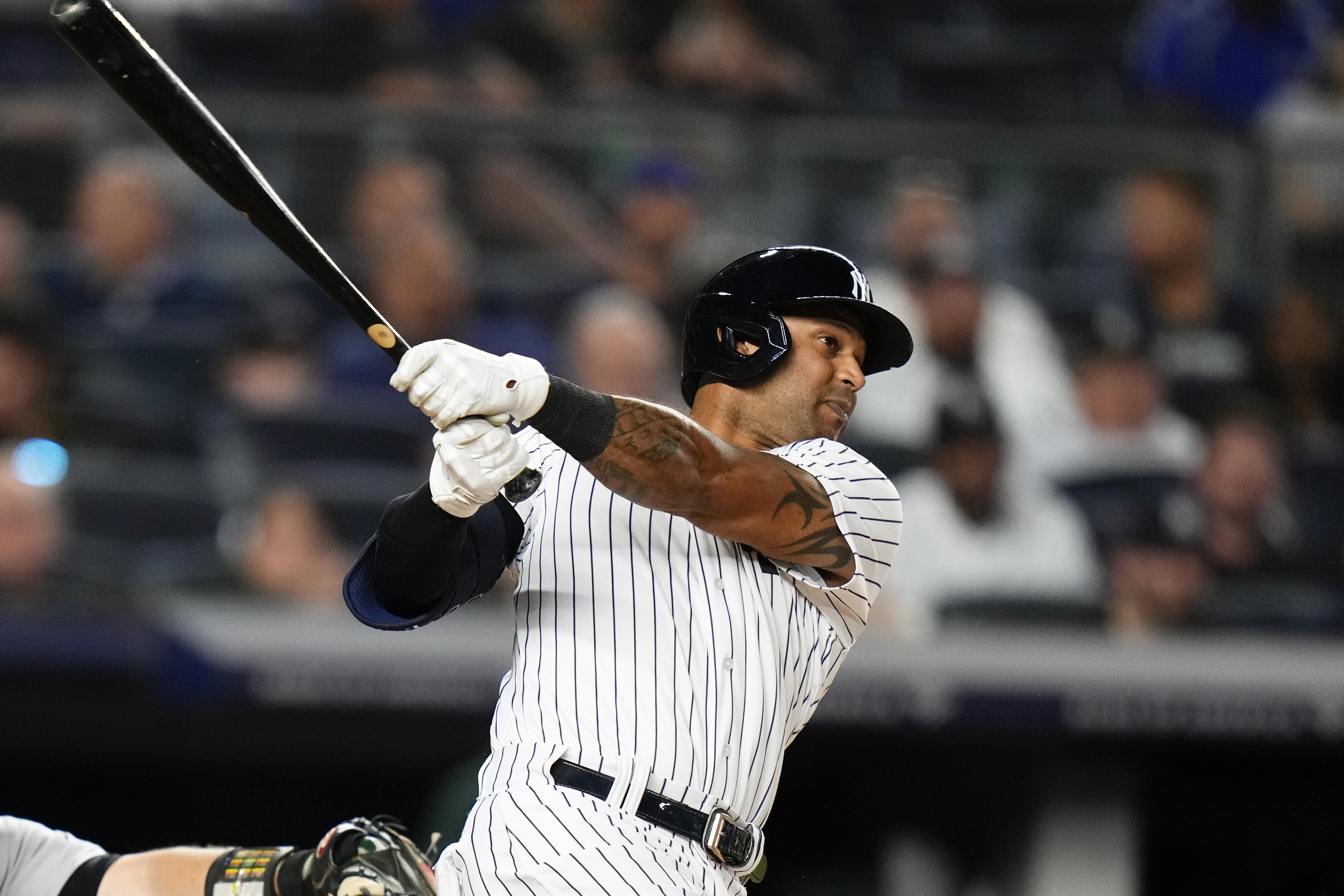 Aaron Hicks of the New York Yankees hits a two-run home run in the seventh inning of a game against the Oakland Athletics Monday, May 8, 2023. (AP Photo/Frank Franklin II)