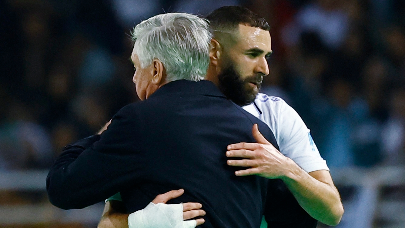 Soccer Football - FIFA Club World Cup - Final - Real Madrid v Al Hilal - Prince Moulay Abdellah Stadium, Rabat, Morocco - February 11, 2023  Real Madrid's Karim Benzema with coach Carlo Ancelotti after being substituted REUTERS/Susana Vera