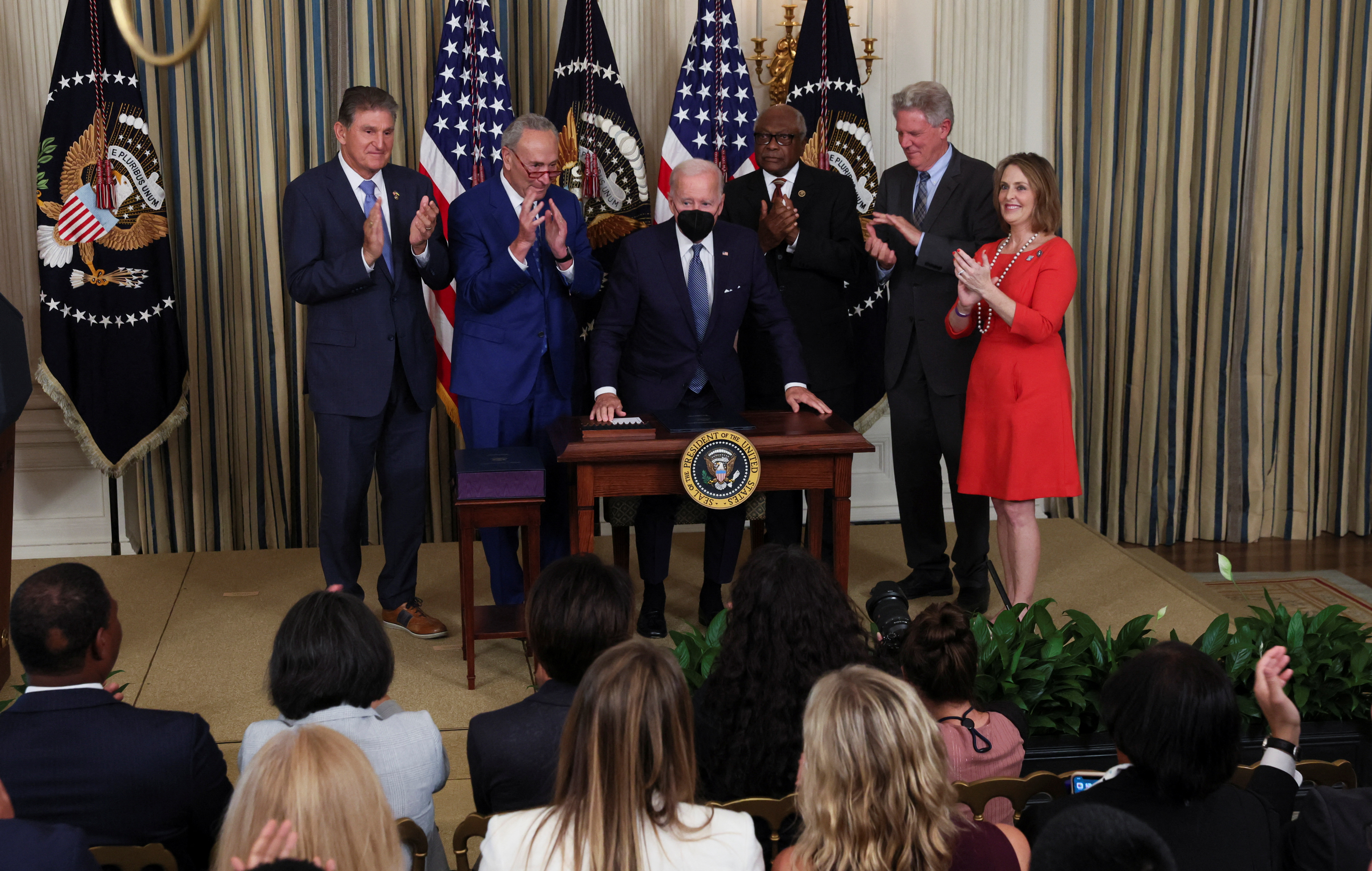 U.S. President Joe Biden signs "The Inflation Reduction Act of 2022" into law at the White House in Washington
