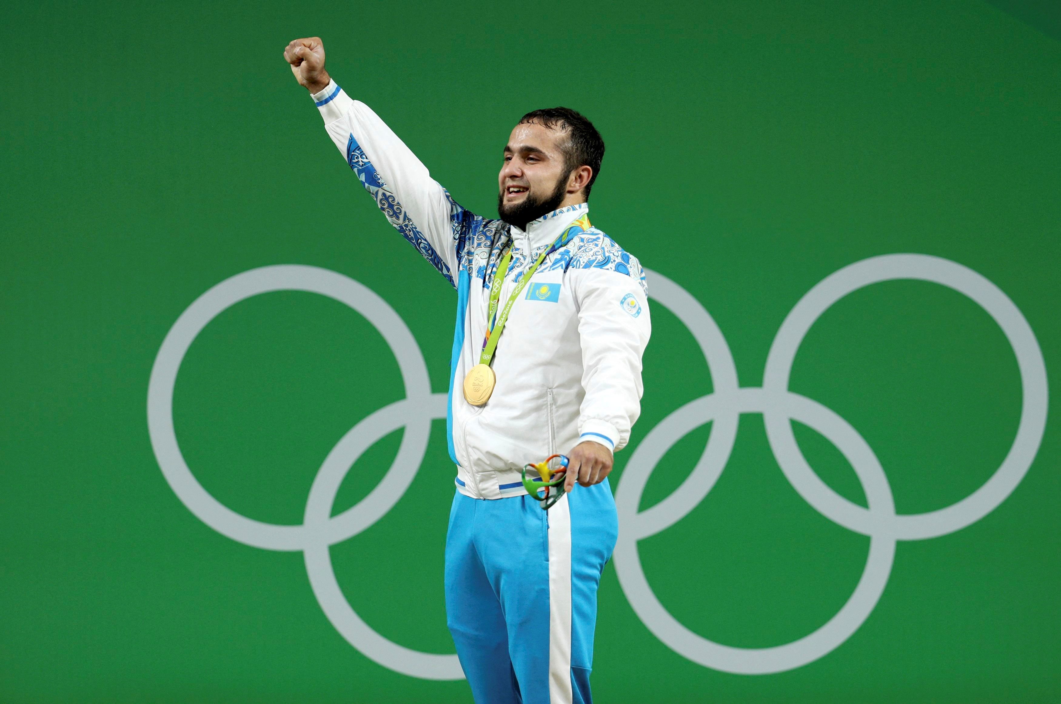 FILE PHOTO: 2016 Rio Olympics - Weightlifting - Victory Ceremony - Men's 77kg Victory Ceremony - Riocentro - Pavilion 2 - Rio de Janeiro, Brazil - 10/08/2016. Nijat Rahimov (KAZ) of Kazakhstan poses with his gold medal. REUTERS/Stoyan Nenov FOR EDITORIAL USE ONLY. NOT FOR SALE FOR MARKETING OR ADVERTISING CAMPAIGNS./File Photo