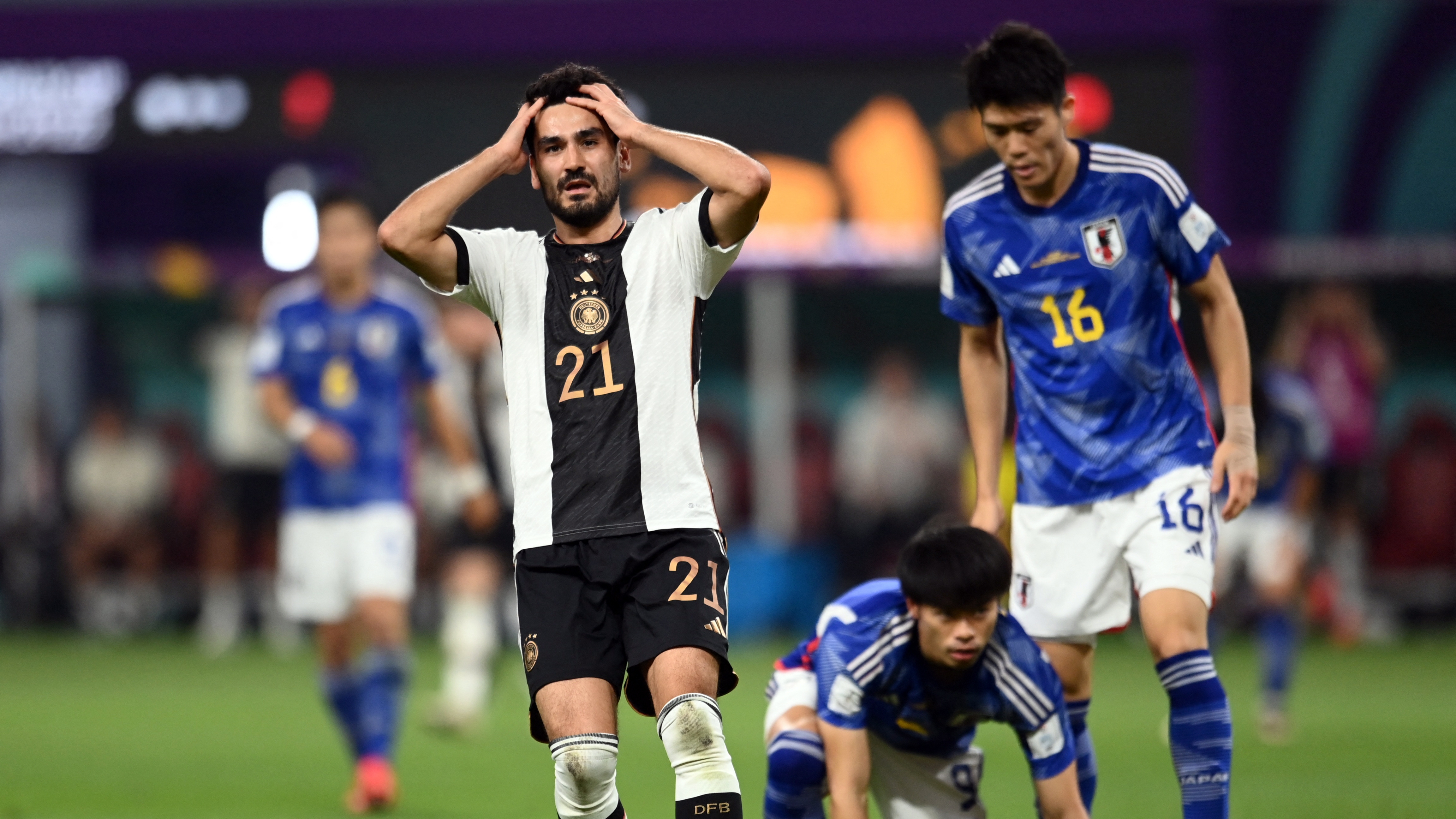 Soccer Football - FIFA World Cup Qatar 2022 - Group E - Germany v Japan - Khalifa International Stadium, Doha, Qatar - November 23, 2022 Germany's Ilkay Gundogan reacts after shooting at goal and hitting the post REUTERS/Annegret Hilse