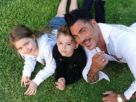 Marta and Felipe with their father, Ricardo Fort