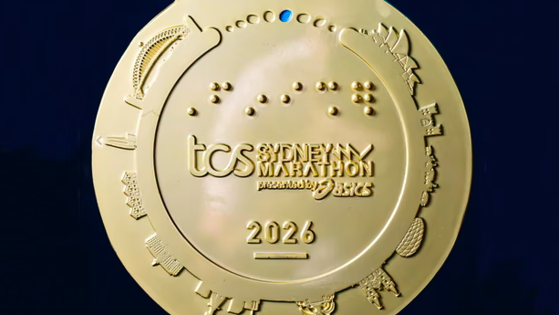 El ins&oacute;lito error en la medalla del Marat&oacute;n de S&iacute;dney: incluyeron un estadio de Alemania