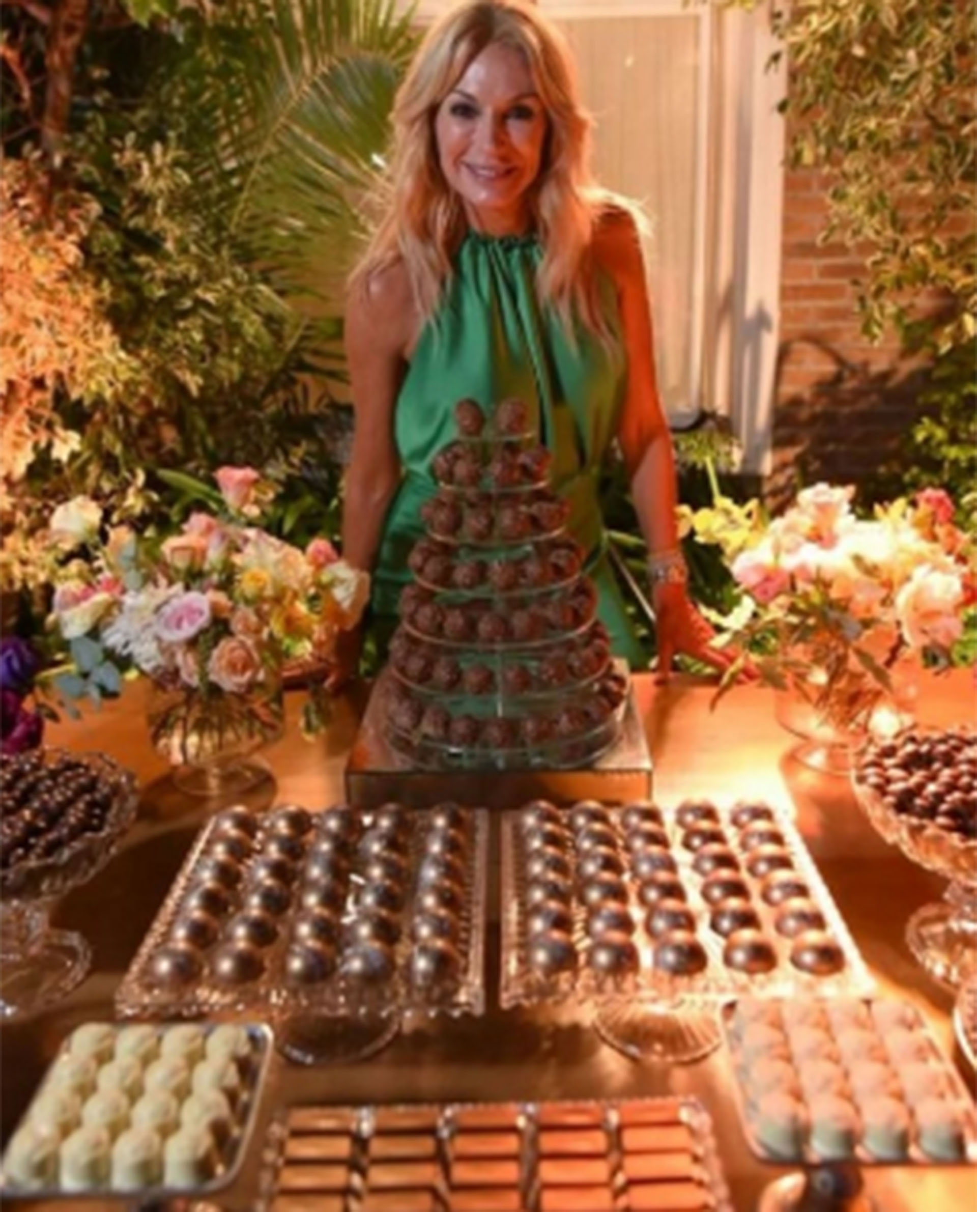 Yanina Latorre with the large chocolate table
