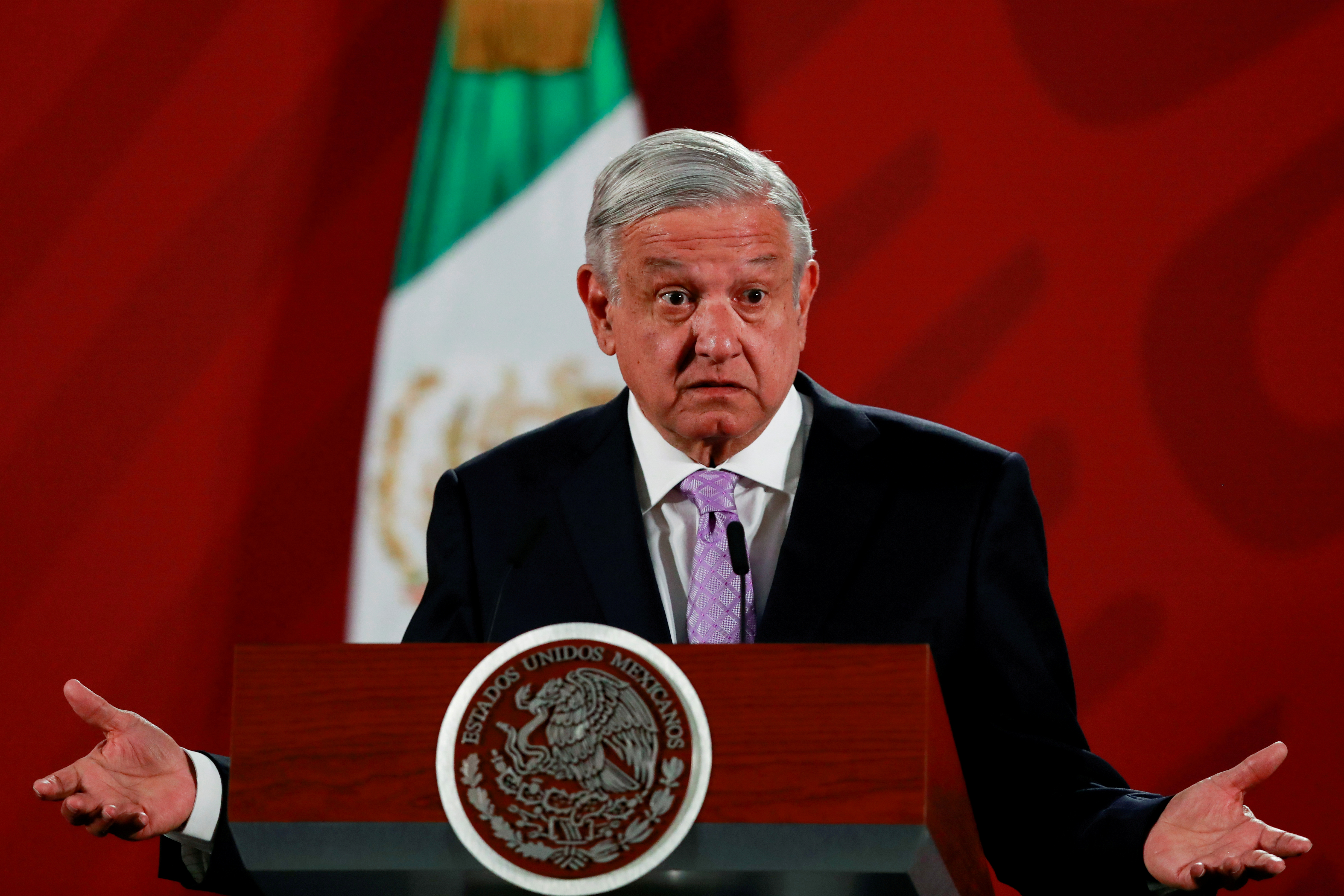 FILE PHOTO: Mexico's President Andres Manuel Lopez Obrador gestures as he speaks during a news conference at the National Palace in Mexico City, Mexico February 18, 2020. REUTERS/Henry Romero/File Photo