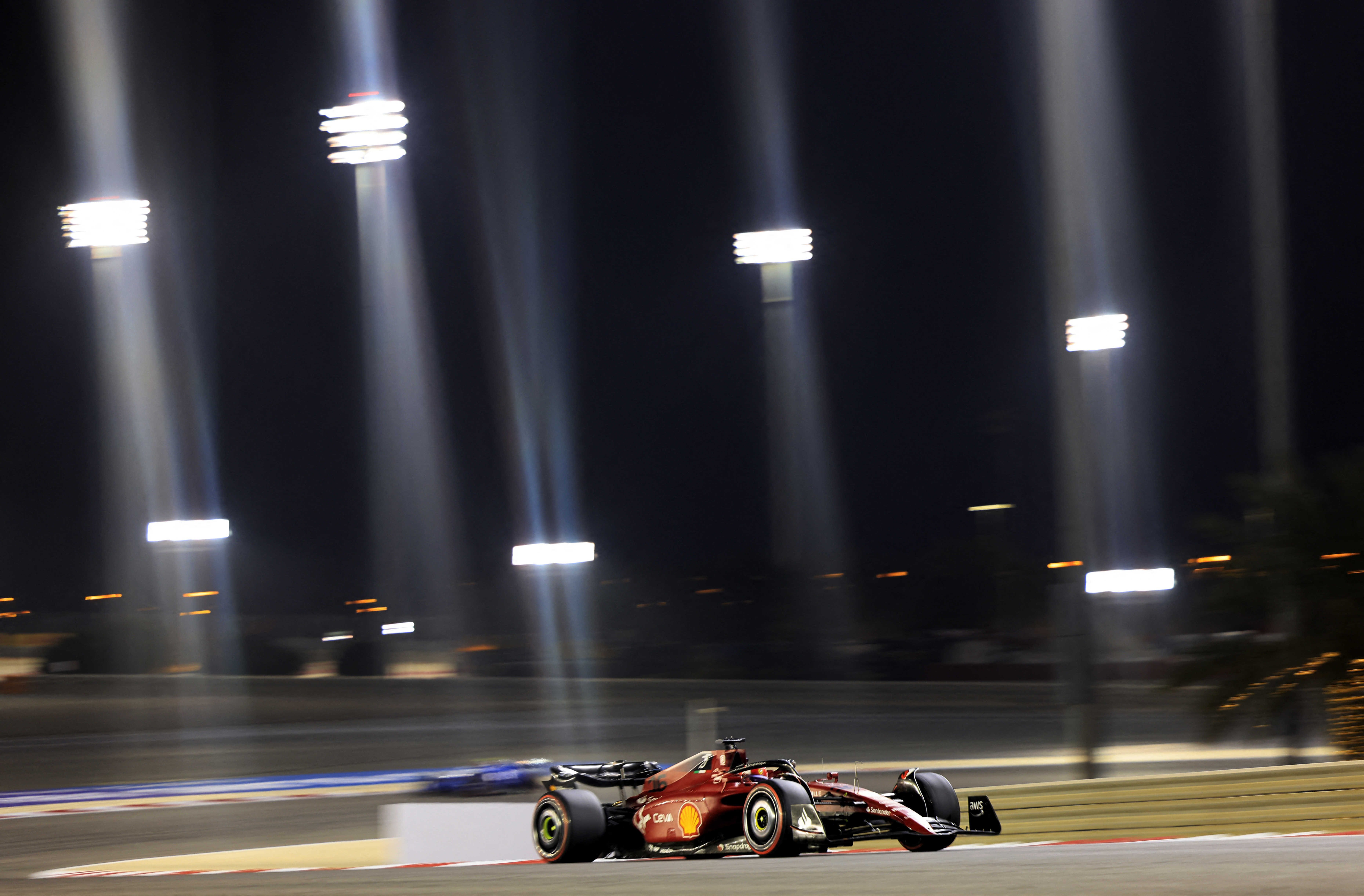 Formula One F1 - Bahrain Grand Prix - Bahrain International Circuit, Sakhir, Bahrain - March 20, 2022 Ferrari's Charles Leclerc in action during the race REUTERS/Thaier Al-Sudani