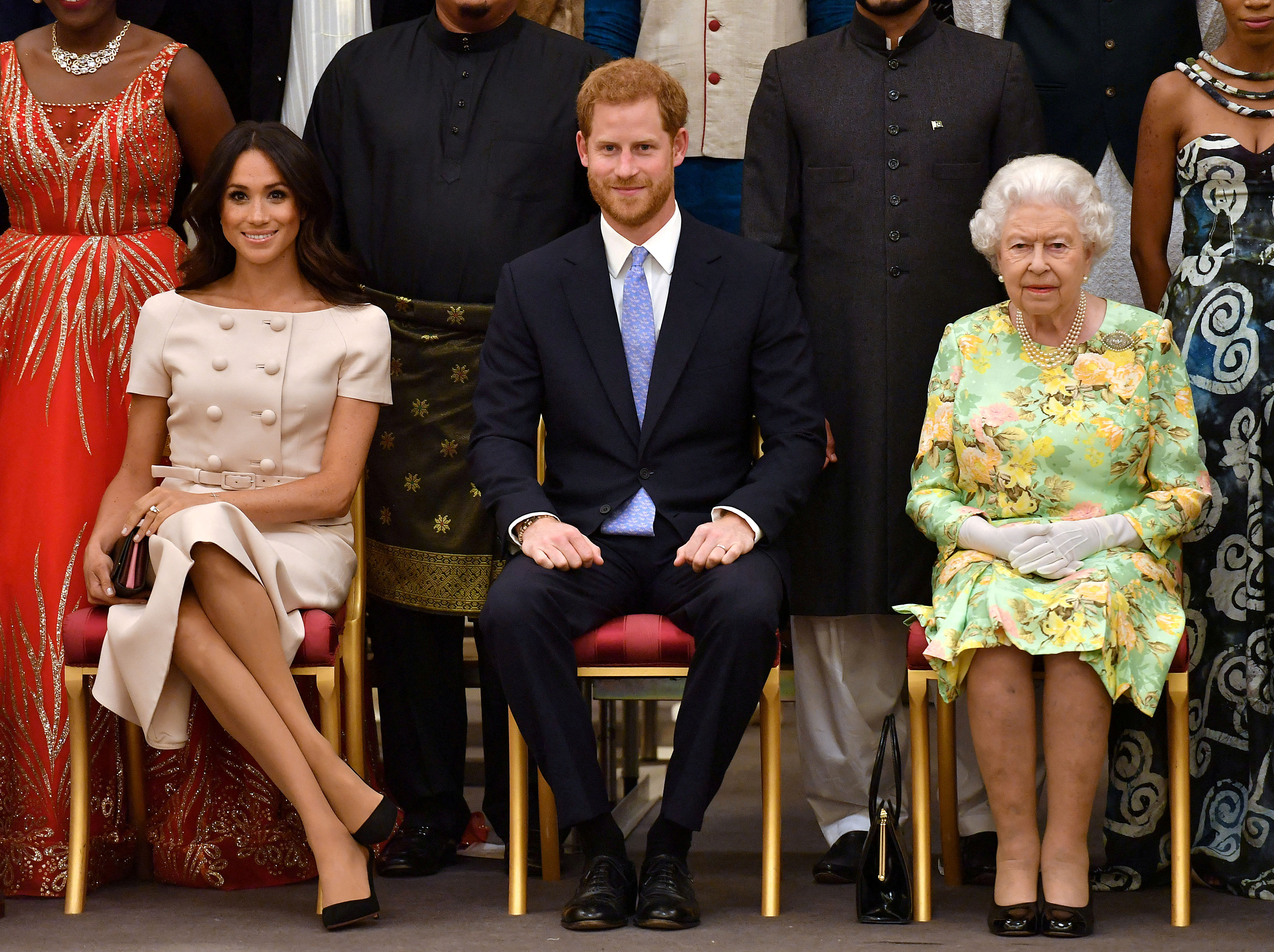 Harry, Meghan Markle y la reina en 2018 (John Stillwell/Reuters/archivo)