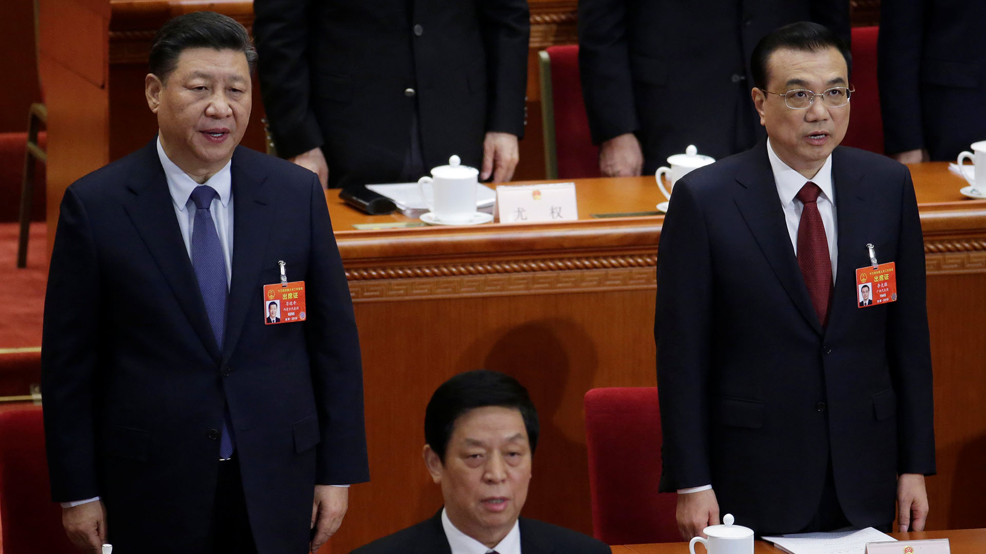 El presidente chino Xi Jinping, el primer ministro Li Keqiang, y Li Zhanshu, presidente del Comité Permanente de la Asamblea Popular Nacional (Reuters)