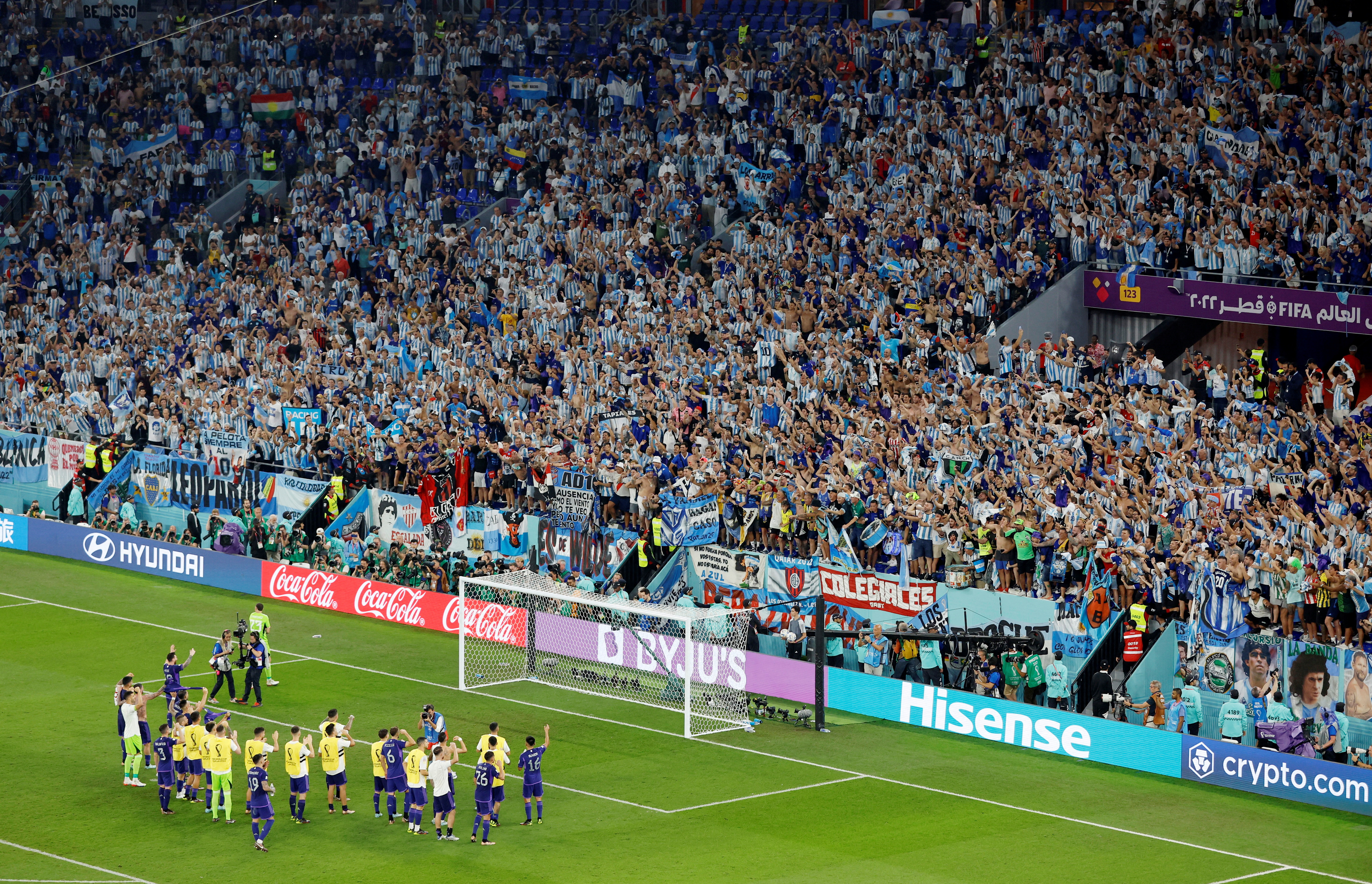 Soccer Football - FIFA World Cup Qatar 2022 - Group C - Poland v Argentina - Stadium 974, Doha, Qatar - November 30, 2022 Argentina players celebrate qualifying for the knockout stages REUTERS/Issei Kato     TPX IMAGES OF THE DAY