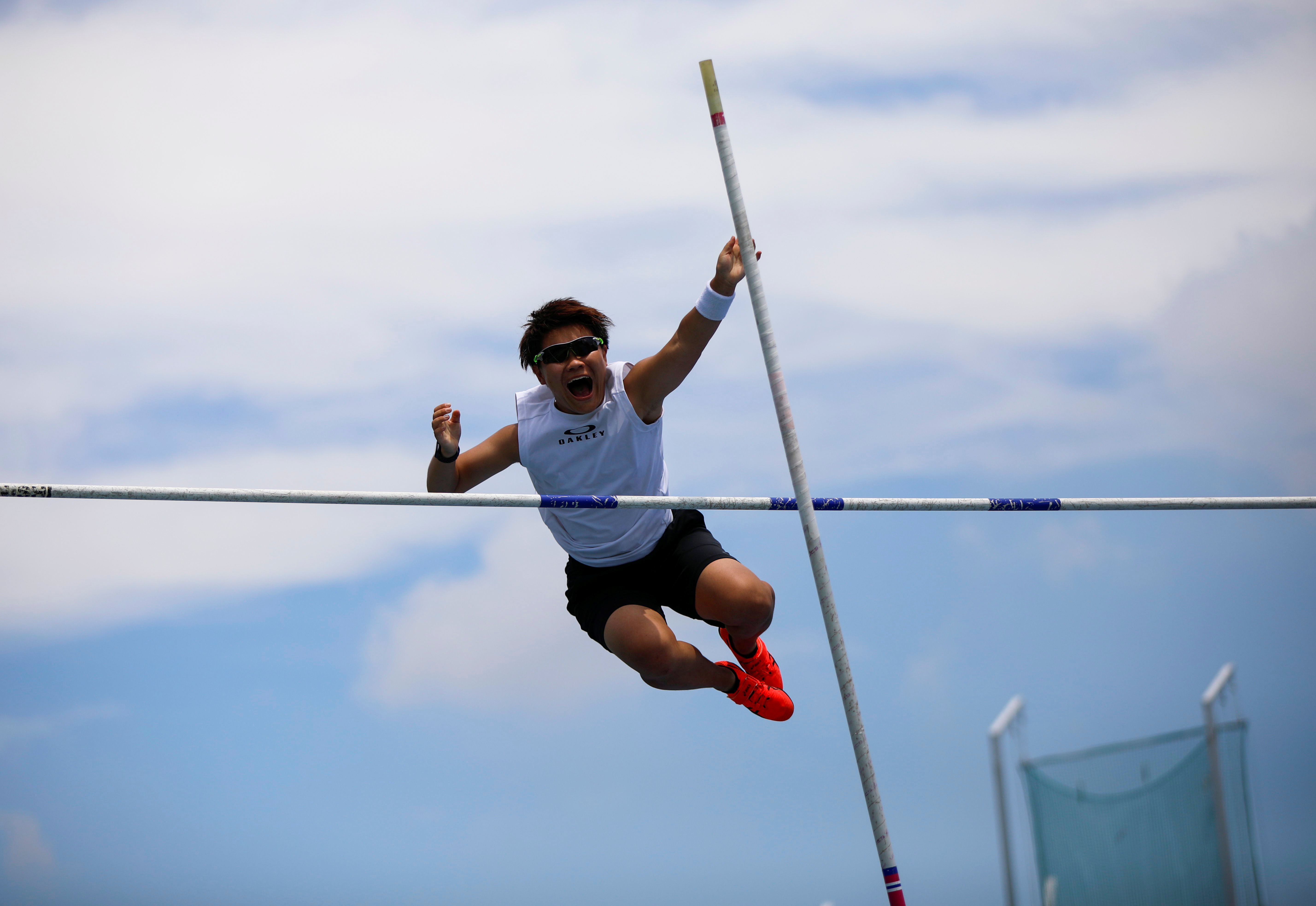 So Sato, 25, a deaf and transgender pole vaulter, works out during a camp training with other deaf athletes in Utsunomiya, north of Tokyo, Japan July 10, 2021. Picture taken July 10, 2021.  REUTERS/Issei Kato
