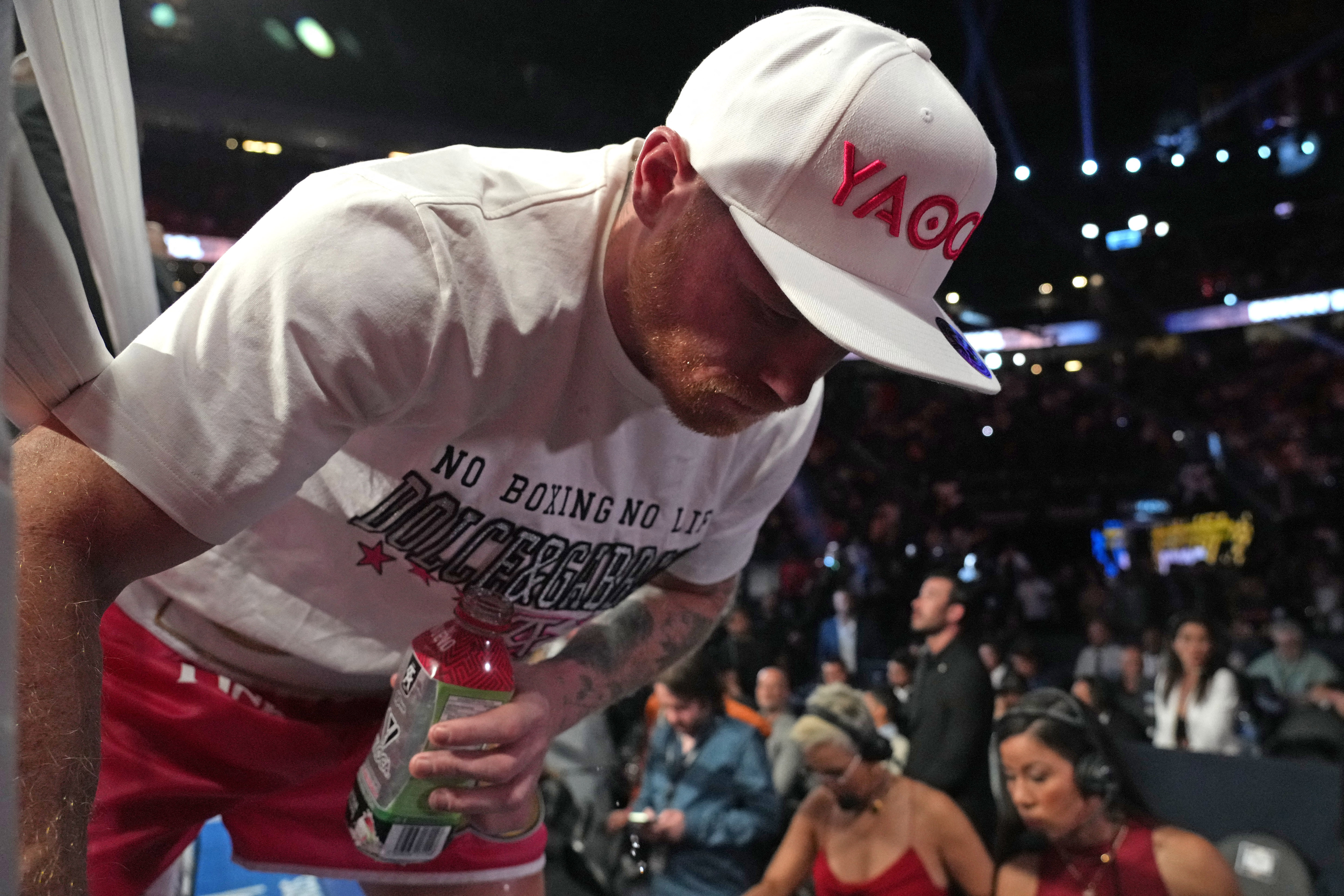 May 7, 2022; Las Vegas, Nevada, USA; Canelo Alvarez exits the ring after being defeated by Dimitry Bivol (not pictured) in their light heavyweight championship bout at T-Mobile Arena. Mandatory Credit: Joe Camporeale-USA TODAY Sports