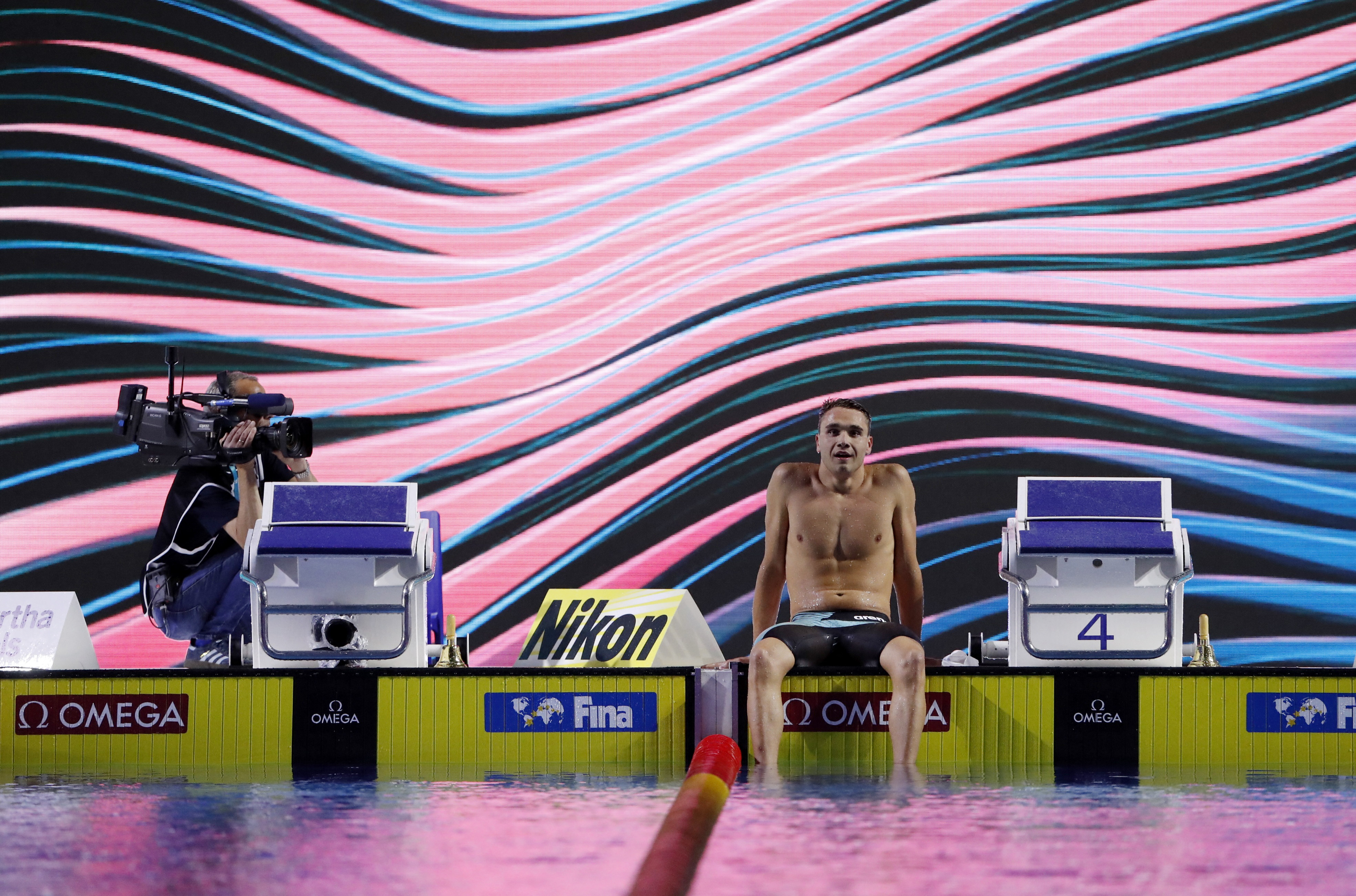 Swimming - FINA World Championships - Budapest, Hungary  - June 21, 2022 Hungary's Kristof Milak celebrates after winning the men's 200m butterfly final REUTERS/Bernadett Szabo