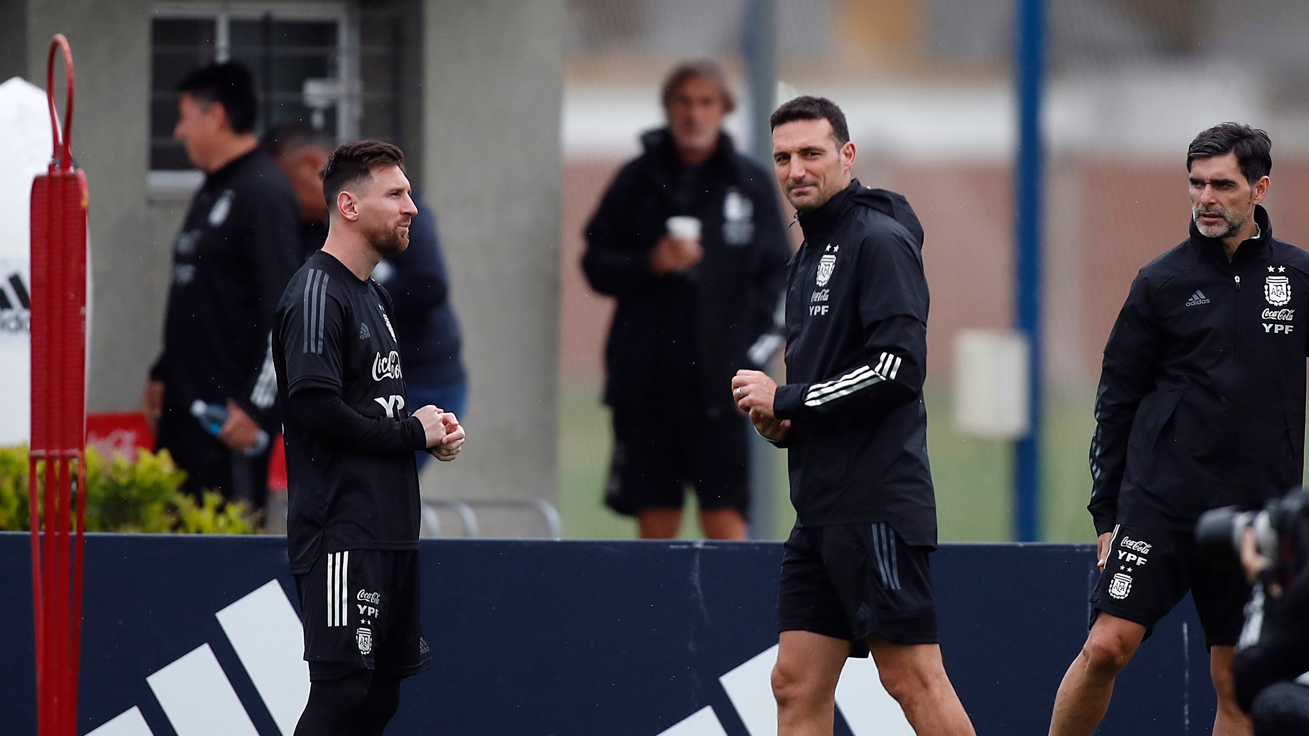 Soccer Football - World Cup - South American Qualifiers - Argentina Training - Julio Humberto Grondona Training Camp, Ezeiza, Argentina - October 13, 2021 Argentina's Lionel Messi with coach Lionel Scaloni during training REUTERS/Agustin Marcarian