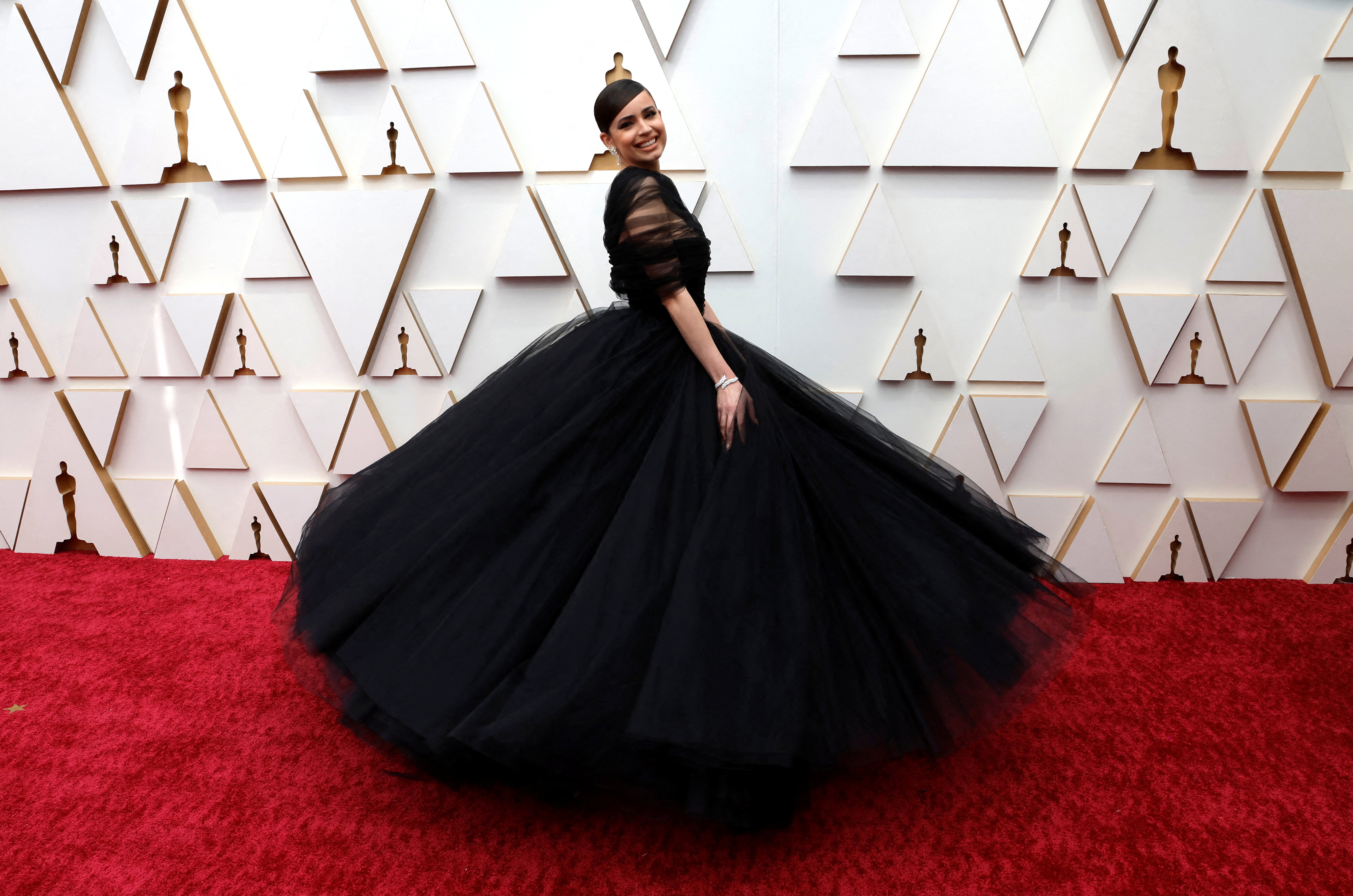 Sofia Carson poses on the red carpet during the Oscars arrivals at the 94th Academy Awards in Hollywood, Los Angeles, California, U.S., March 27, 2022. REUTERS/Eric Gaillard     TPX IMAGES OF THE DAY