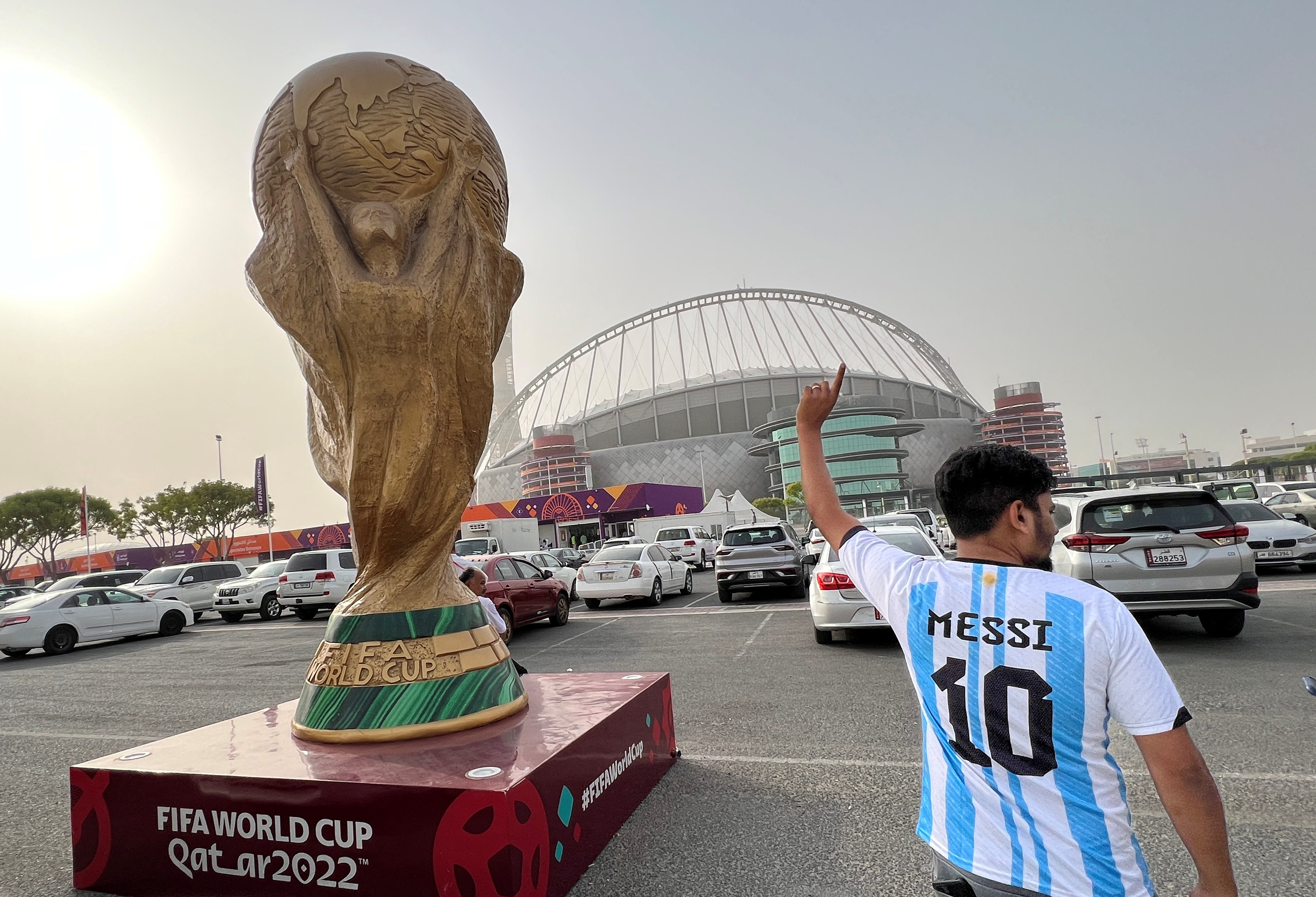 A sculpture of the World Cup trophy is pictured in front of Khalifa International Stadium ahead of the FIFA 2022 Worldcup soccer tournament in Doha, Qatar November 9, 2022. REUTERS/Stringer