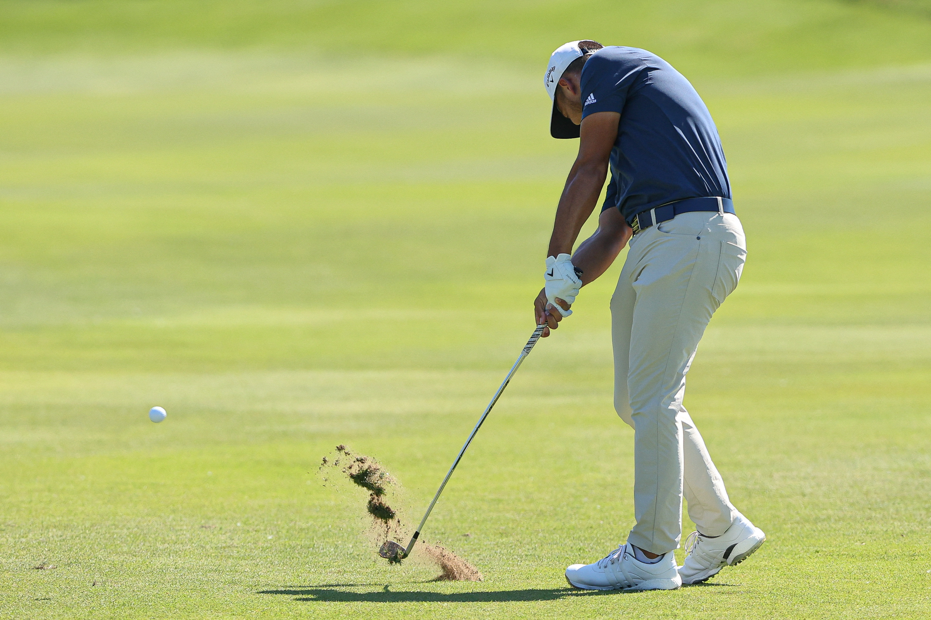 Jun 25, 2022; Cromwell, Connecticut, USA; Xander Schauffele plays a shot from the fairway of the ninth hole during the third round of the Travelers Championship golf tournament. Mandatory Credit: Vincent Carchietta-USA TODAY Sports