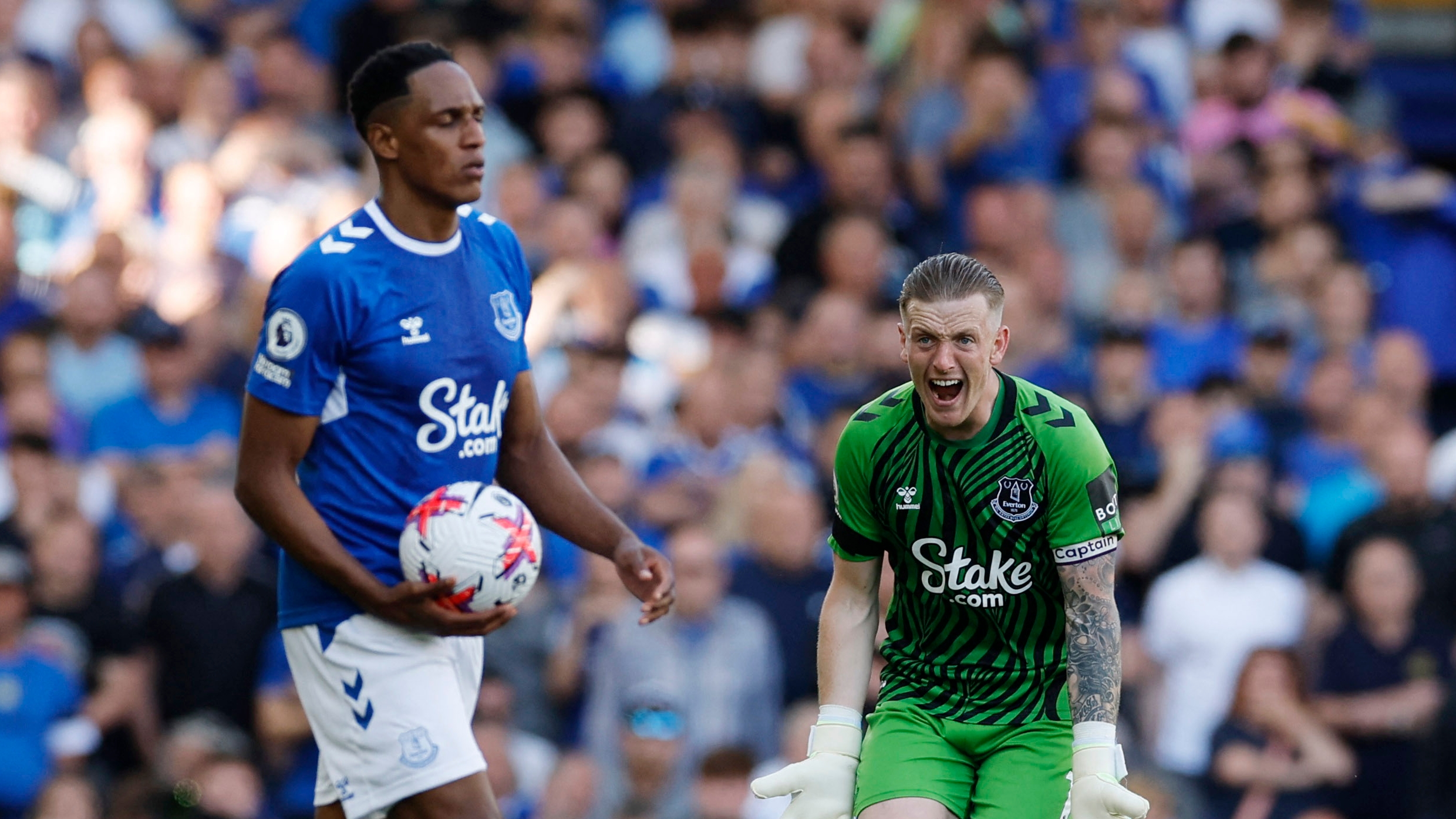 Soccer Football - Premier League - Everton v AFC Bournemouth - Goodison Park, Liverpool, Britain - May 28, 2023 Everton's Yerry Mina and Jordan Pickford react Action Images via Reuters/Jason Cairnduff EDITORIAL USE ONLY. No use with unauthorized audio, video, data, fixture lists, club/league logos or 'live' services. Online in-match use limited to 75 images, no video emulation. No use in betting, games or single club /league/player publications.  Please contact your account representative for further details.