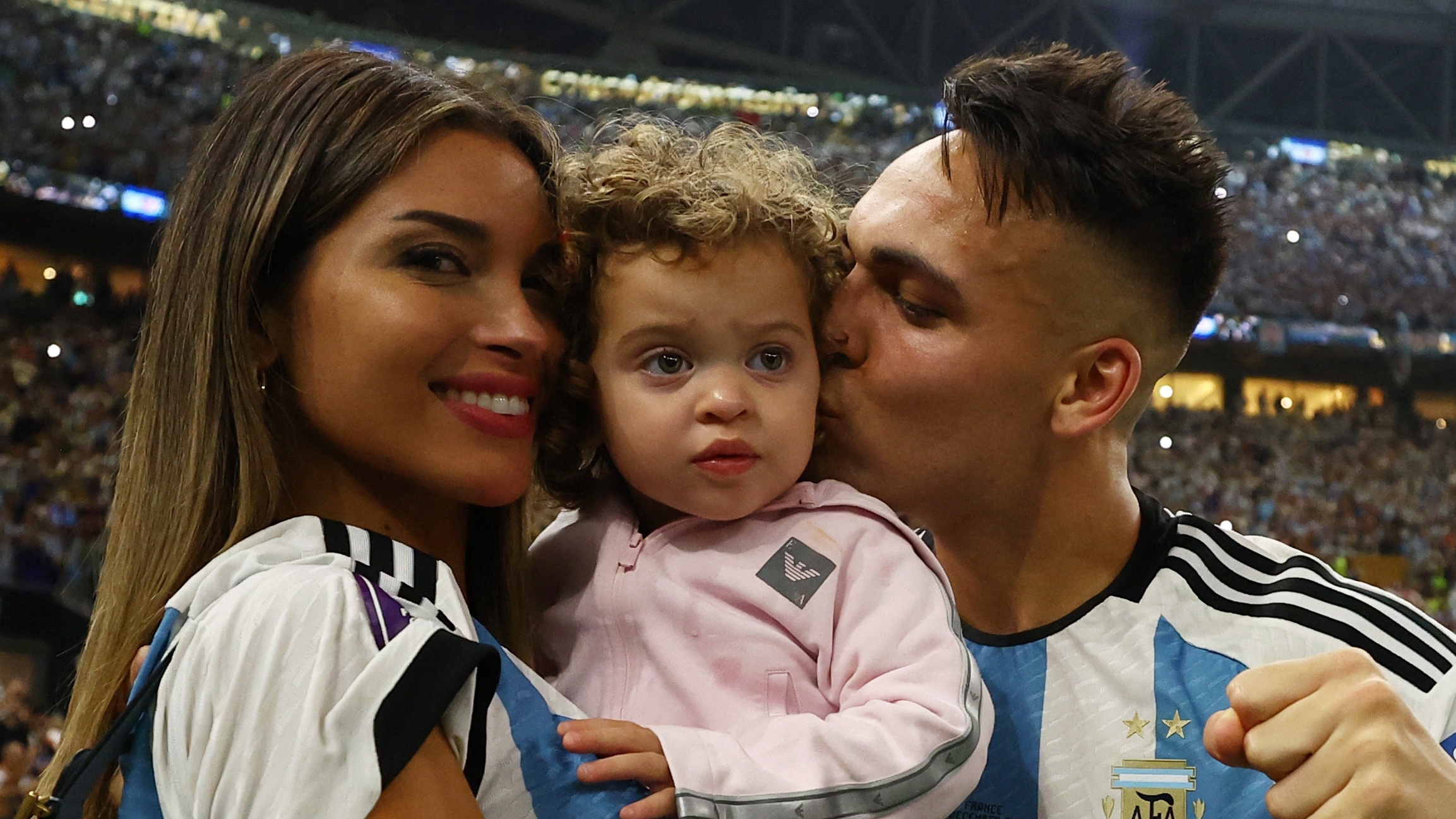 Soccer Football - FIFA World Cup Qatar 2022 - Final - Argentina v France - Lusail Stadium, Lusail, Qatar - December 18, 2022 Argentina's Lautaro Martinez with his partner Agustina Gandolfo after the trophy ceremony REUTERS/Lee Smith