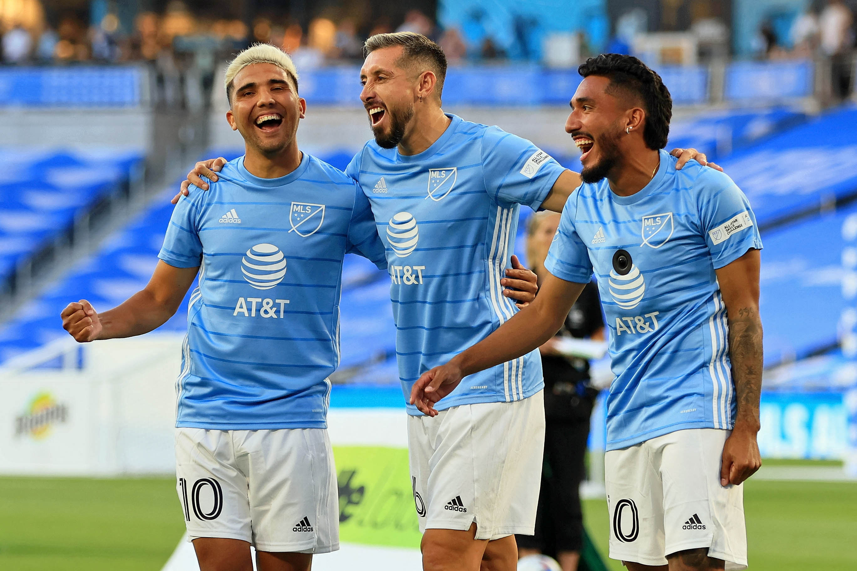 Aug 9, 2022; Saint Paul, MN, USA; MLS midfielder Emanuel Reynoso (16) of Minnesota United (left) midfielder Hector Herrera (16) of Houston Dynamo (center) and forward Jesus Ferreira (20) of FC Dallas (right) celebrate during the 2022 MLS All-Star Skills Challenge at Allianz Field. Mandatory Credit: Aaron Doster-USA TODAY Sports