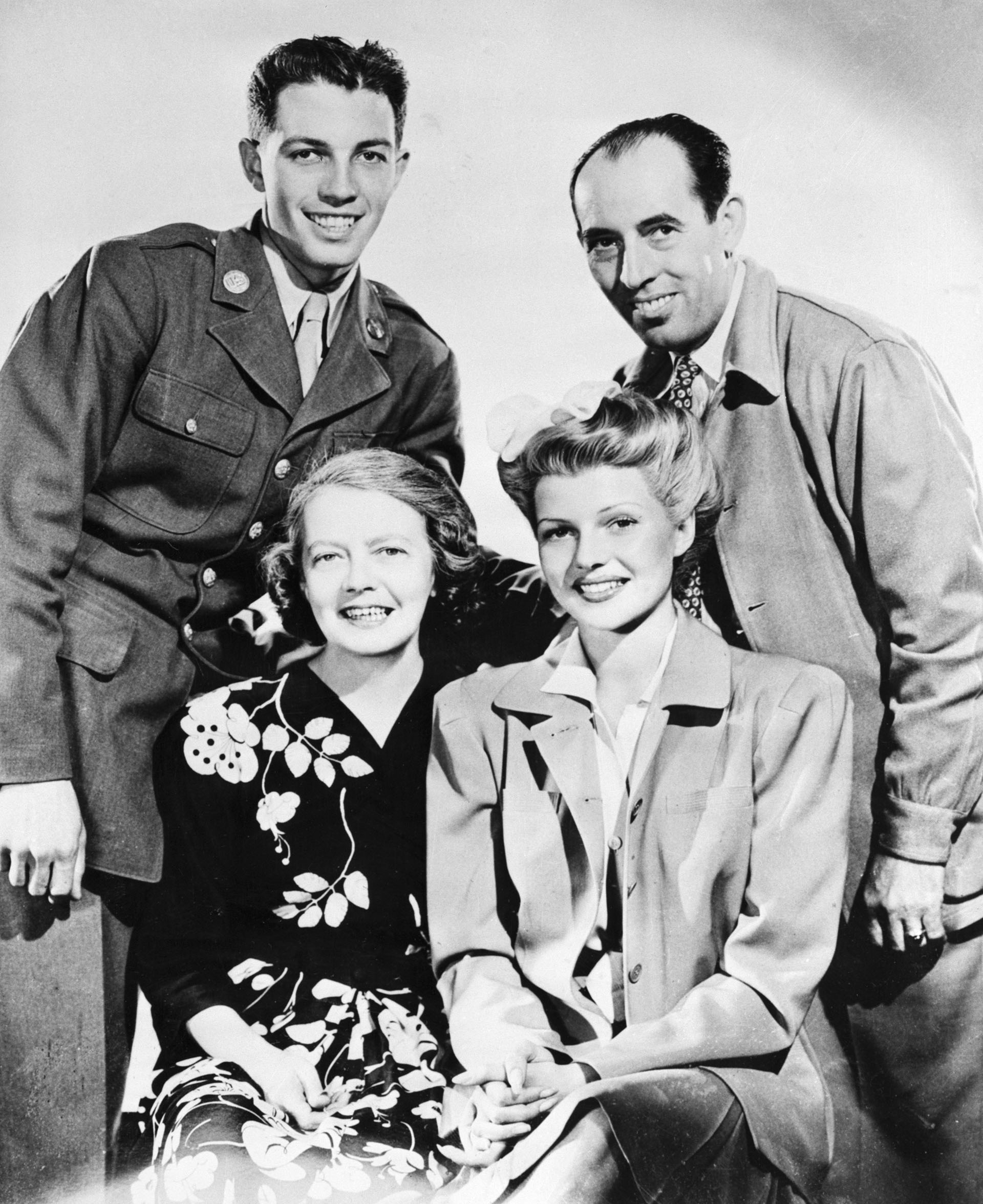 Rita Hayworth with her family: her mother Volga Hayworth, her father Eduardo Cansino and her brother (Bettmann Archive)