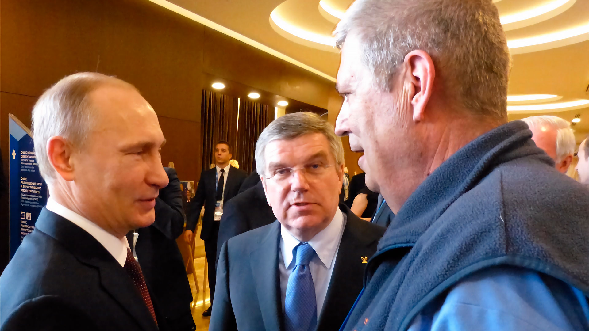 Vladimir Putin, Thomas Bach and Ed Hula during a conversation in Sochi 2014 / Sheila Scott Hula