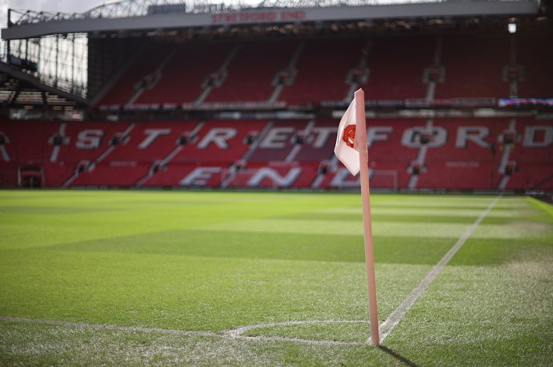 Soccer Football - Premier League - Manchester United v Tottenham Hotspur - Old Trafford, Manchester, UK - March 12, 2022. General view of the corner pennant inside the stadium before the match.  REUTERS/Phil Noble/File Photo