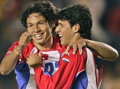 Fabio Escobar junto a Fredy Bareiro en en 2004.