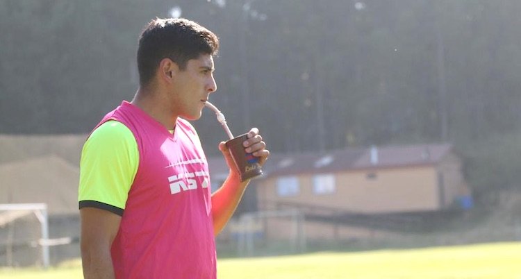 Con su tereré.