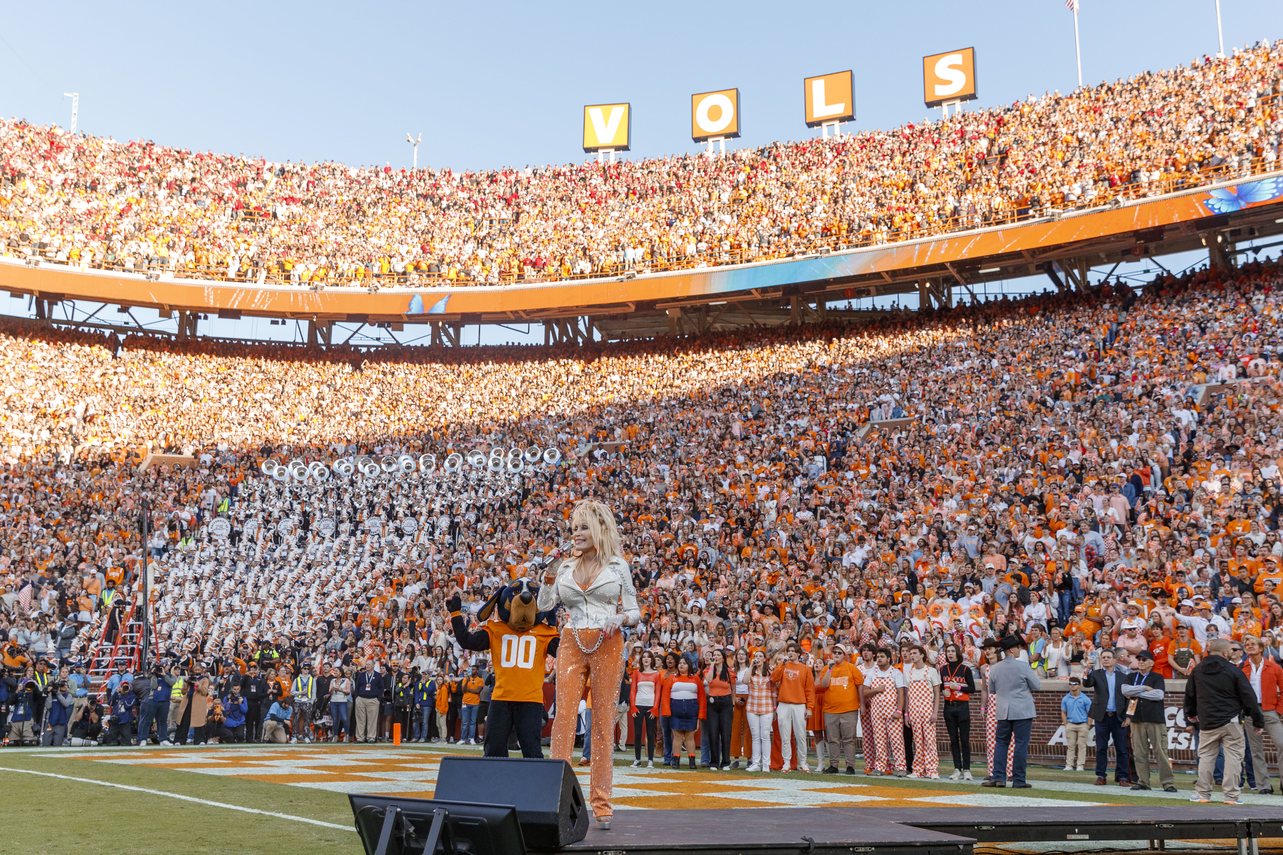 Dolly Parton appearing at Neyland Stadium during a Tennessee Volunteers football event
