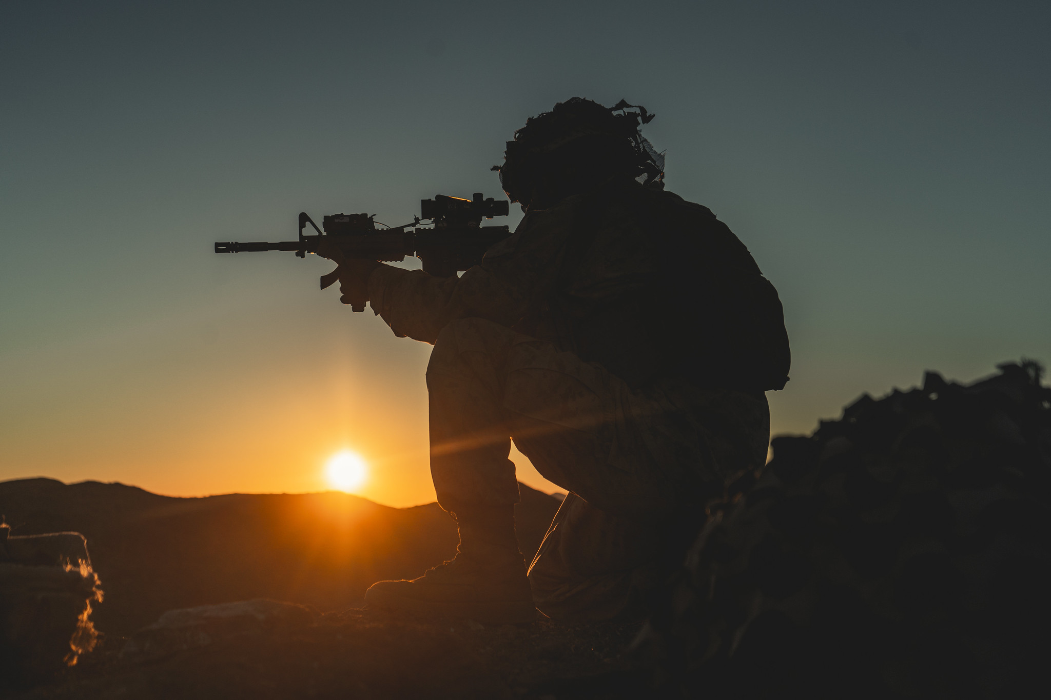 Hospitalman Keifer Ralph sets into a defensive position in support of the Battalion Distributed Operations Course during Service Level Training Exercise 1-21 at Marine Corps Air Ground Combat Center Twentynine Palms, Calif., Oct. 28, 2020. (Lance Cpl. Juan Carpanzano/Marine Corps)