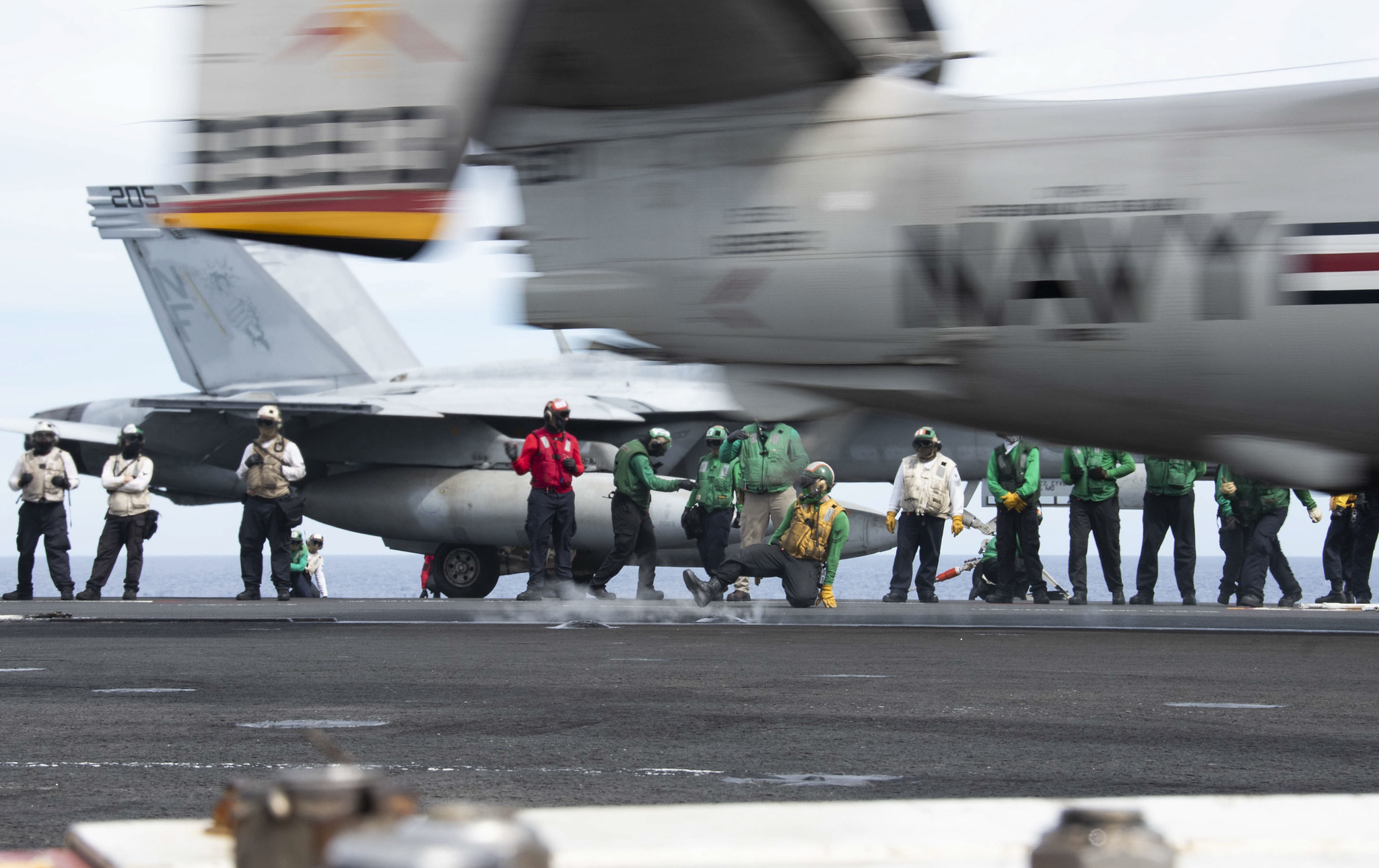 An E-2D Hawkeye launches from the flight deck of the aircraft carrier USS Ronald Reagan (CVN 76) during flight operations June 17, 2020, in the Philippine Sea. (MC3 Erica Bechard/Navy)