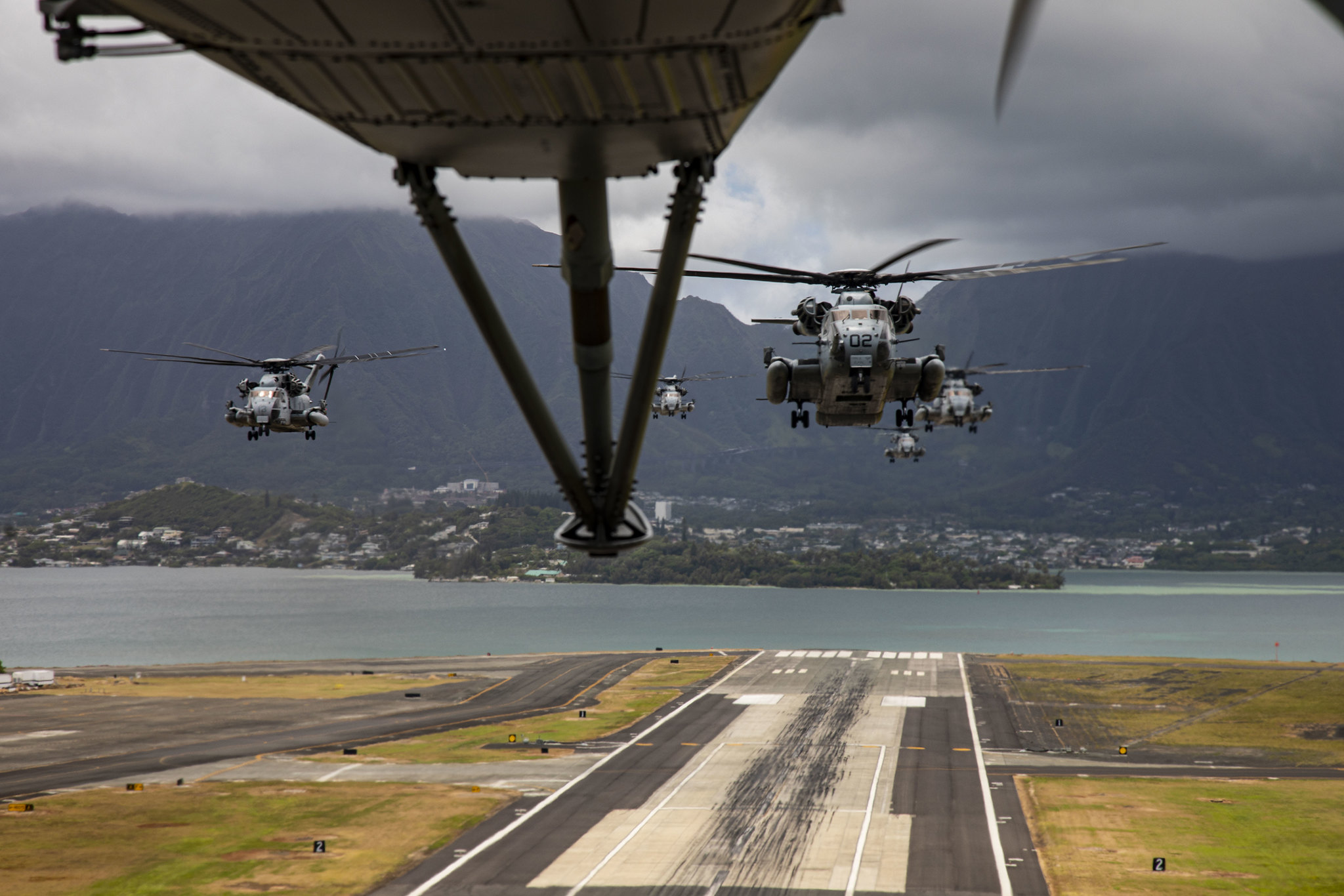 Marine Corps CH-53E Super Stallions take-off during a mass air-training mission on May 19, 2020, at Marine Corps Air Station Kaneohe Bay, Marine Corps Base Hawaii. (Lance Cpl. Samantha Sanchez/Marine Corps)