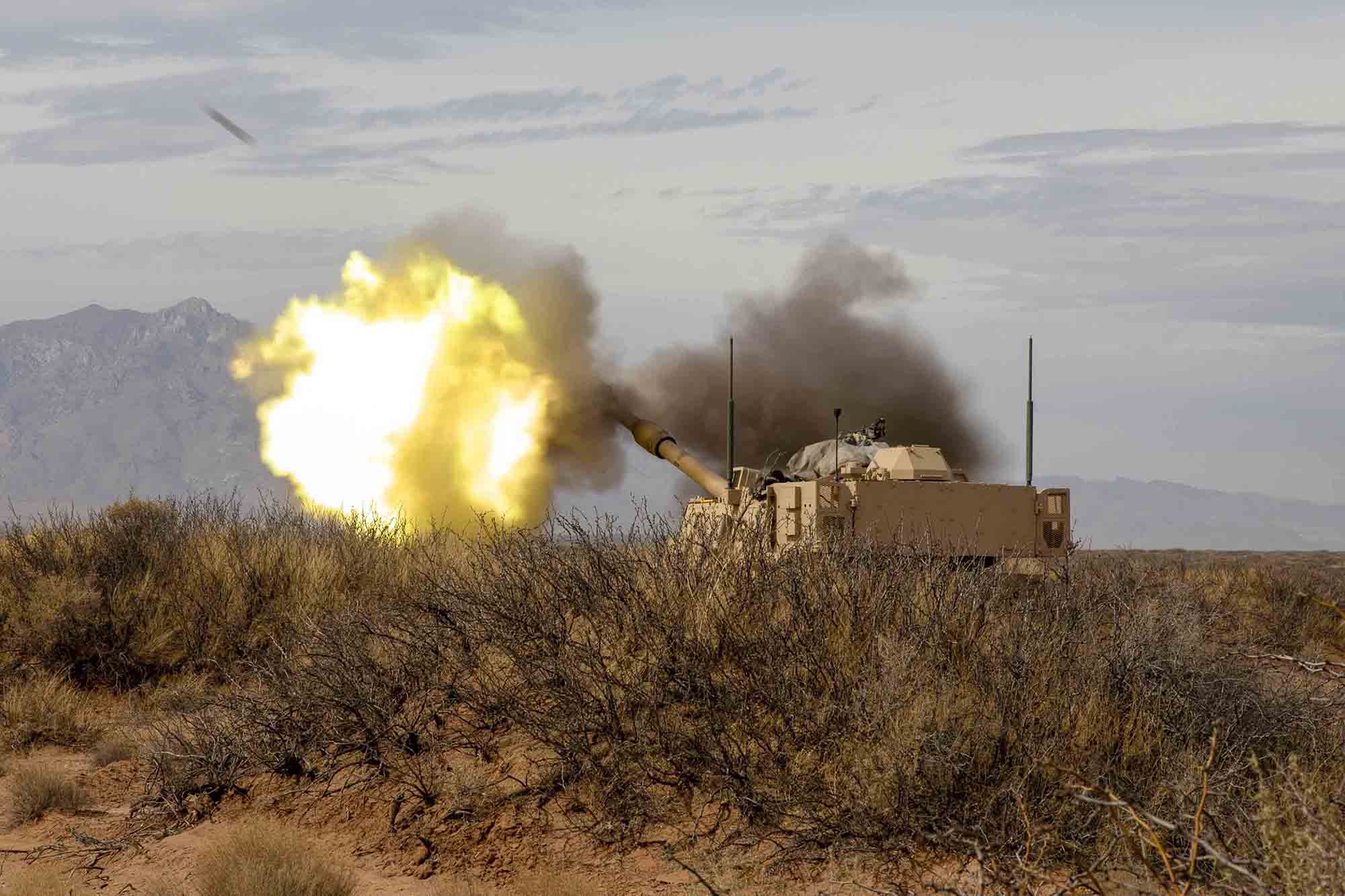 Soldiers with 2nd Battalion, 3rd Field Artillery Regiment, 1st Armored Brigade Combat Team, 1st Armored Division, shoot a M109 Paladin as part of a battalion-level artillery qualification exercise, March 8, 2021, at the Dona Ana Range Complex, N.M. (Pfc. Luis Santiago/Army)