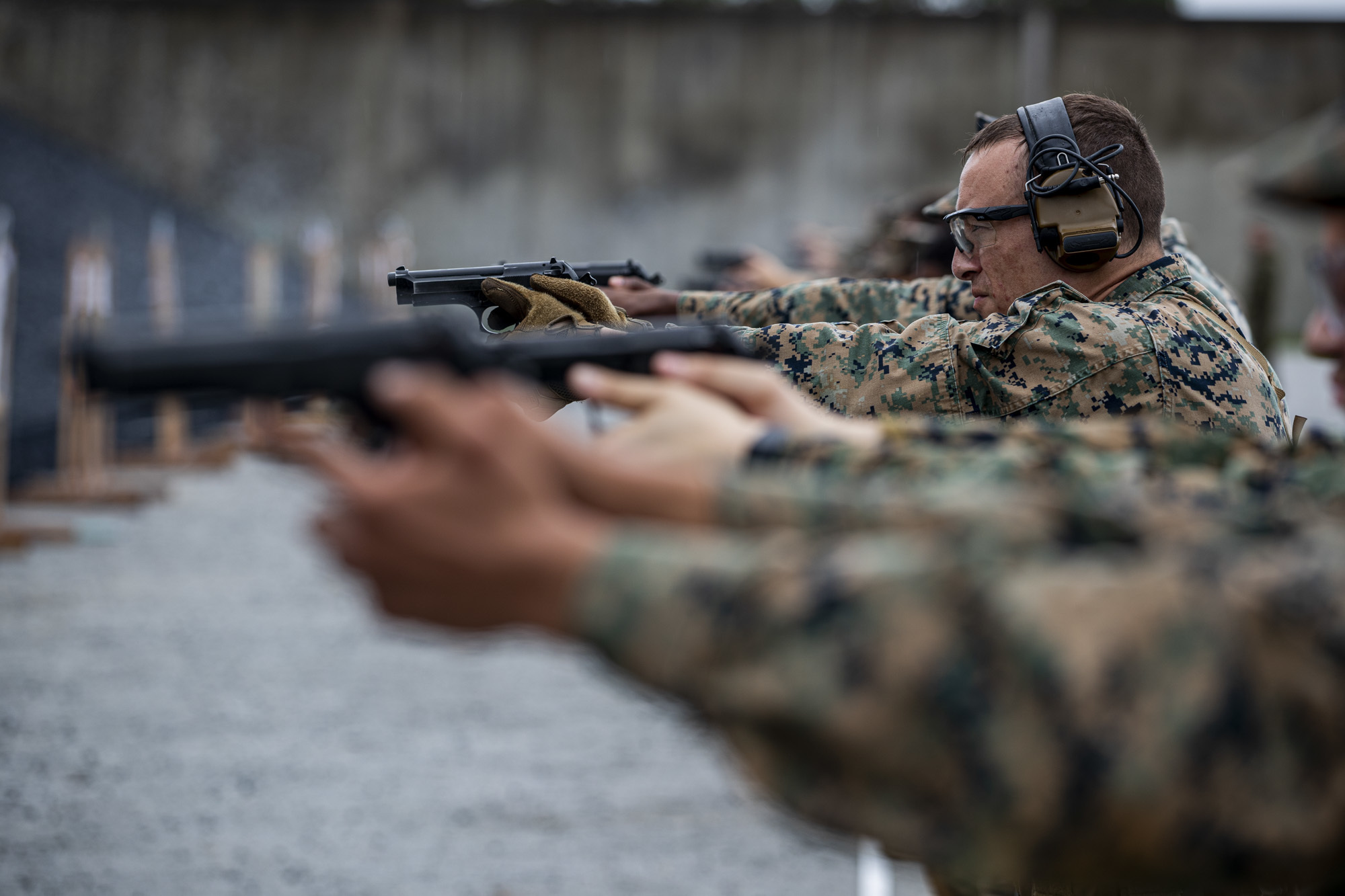 Gunnery Sgt. Nathaniel Schoenhoefer takes aim during the 2020 Far East Intramural Matches on Camp Hansen, Okinawa, Japan, Dec. 10, 2020. (Lance Cpl. Zachary Larsen/Marine Corps)