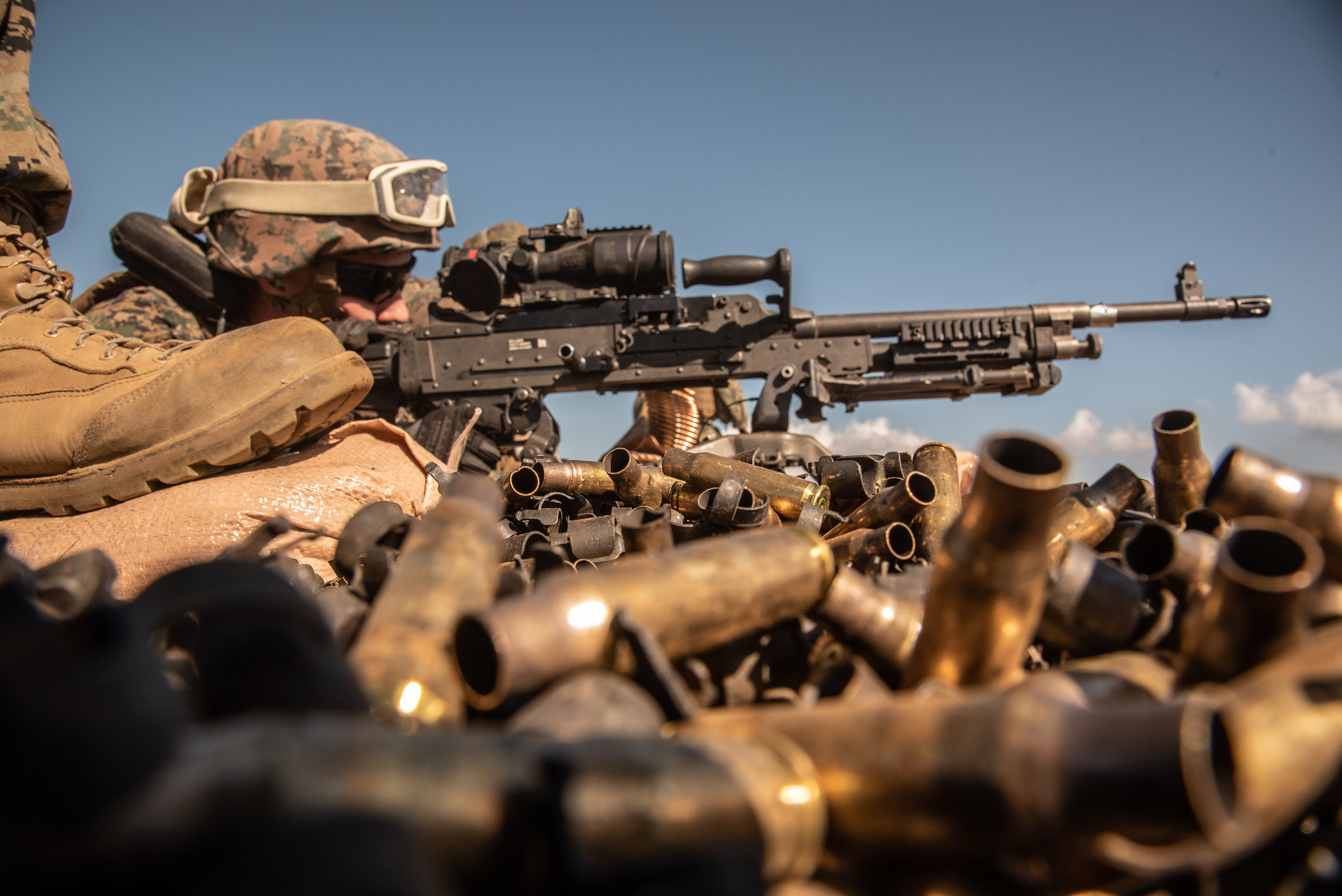 Hospital Corpsman 2nd Class Christopher Walters fires an M240B machine gun during Artillery Relocation Training Program 21.1 at the Combined Arms Training Center at Camp Fuji, Japan, April 26, 2021. (Cpl. Michael Jefferson Estillomo/Marine Corps)