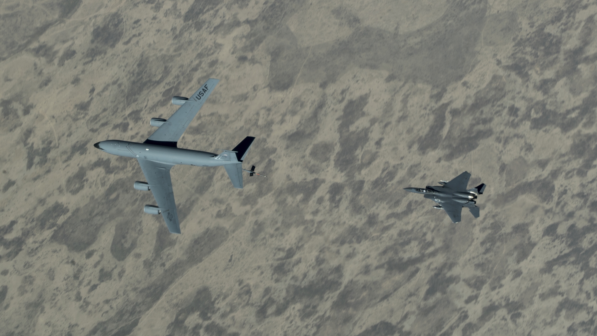 A U.S. Air Force F-15E Strike Eagle approaches a KC-135 Stratotanker over the U.S. Central Command area of responsibility on June 12, 2020. (Senior Airman Brandon Cribelar/Air Force)