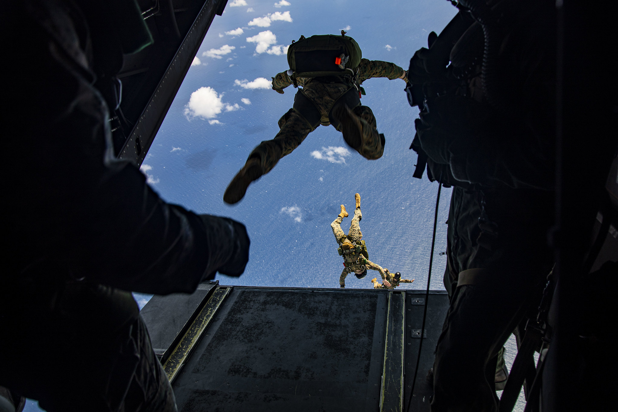 Marines perform parachute operations at Marine Corps Air Station Kaneohe Bay, Marine Corps Base Hawaii, May 28, 2020. (Lance Cpl. Samantha Sanchez/Marine Corps)