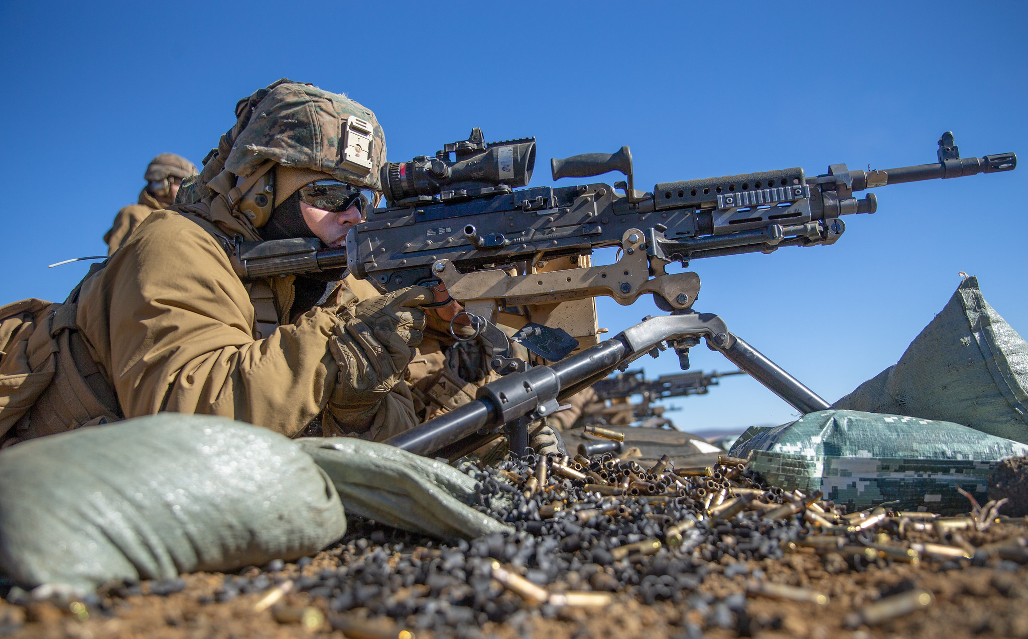 Hospital Corpsman 3rd Class Neil Rioja participates in live-fire M240B machine gun range training Feb. 9, 2021, during Artillery Relocation Training Program 20.4 at Combined Arms Training Center, Camp Fuji, Japan. (Lance Cpl. Scott Aubuchon/Marine Corps)