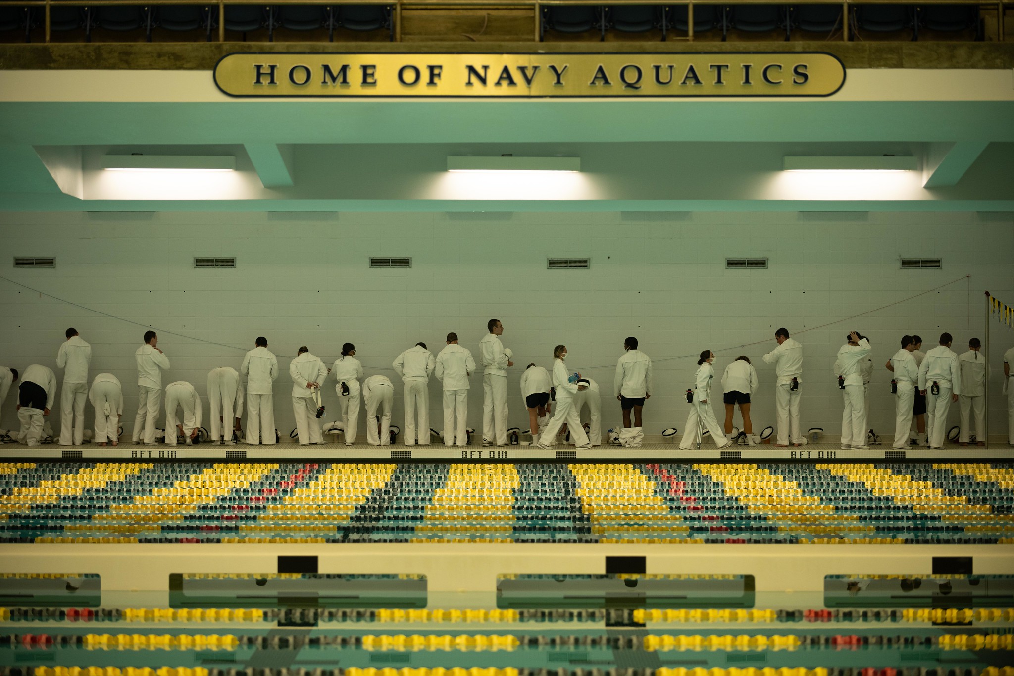 Midshipmen 4th Class, or plebes, from the United States Naval Academy Class of 2024 complete swim training on Aug. 5, 2020, during Plebe Summer, a demanding indoctrination period intended to transition the candidates from civilian to military life. (MC2 Nathan Burke/Navy)