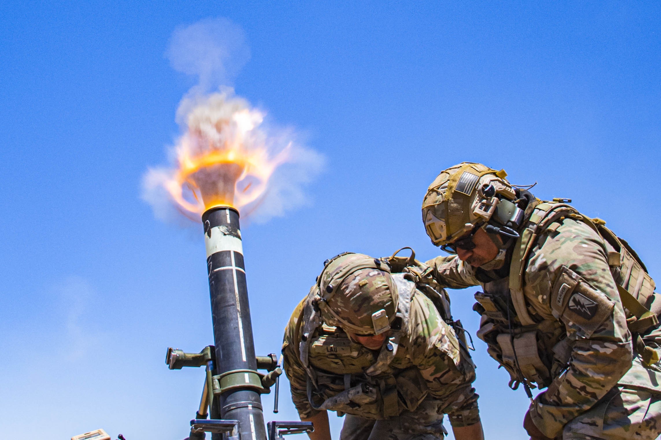 Army Col. Randy Lau fires a 120 mm mortar during a live-fire exercise at Camp Roberts, Calif., June 15. (Staff Sgt. Walter Lowell/Army)