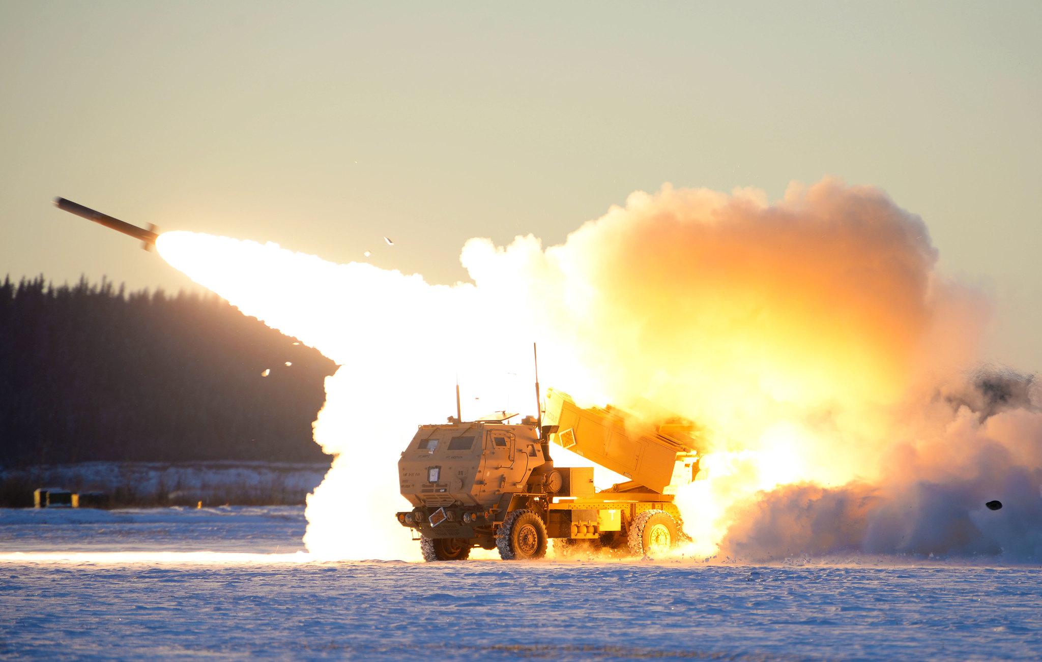 A U.S. Army M142 High Mobility Artillery Rocket Systems (HIMARS) launches ordnance during RED FLAG-Alaska 21-1 at Fort Greely, Alaska, Oct. 22, 2020. (Senior Airman Beaux Hebert/Air Force)