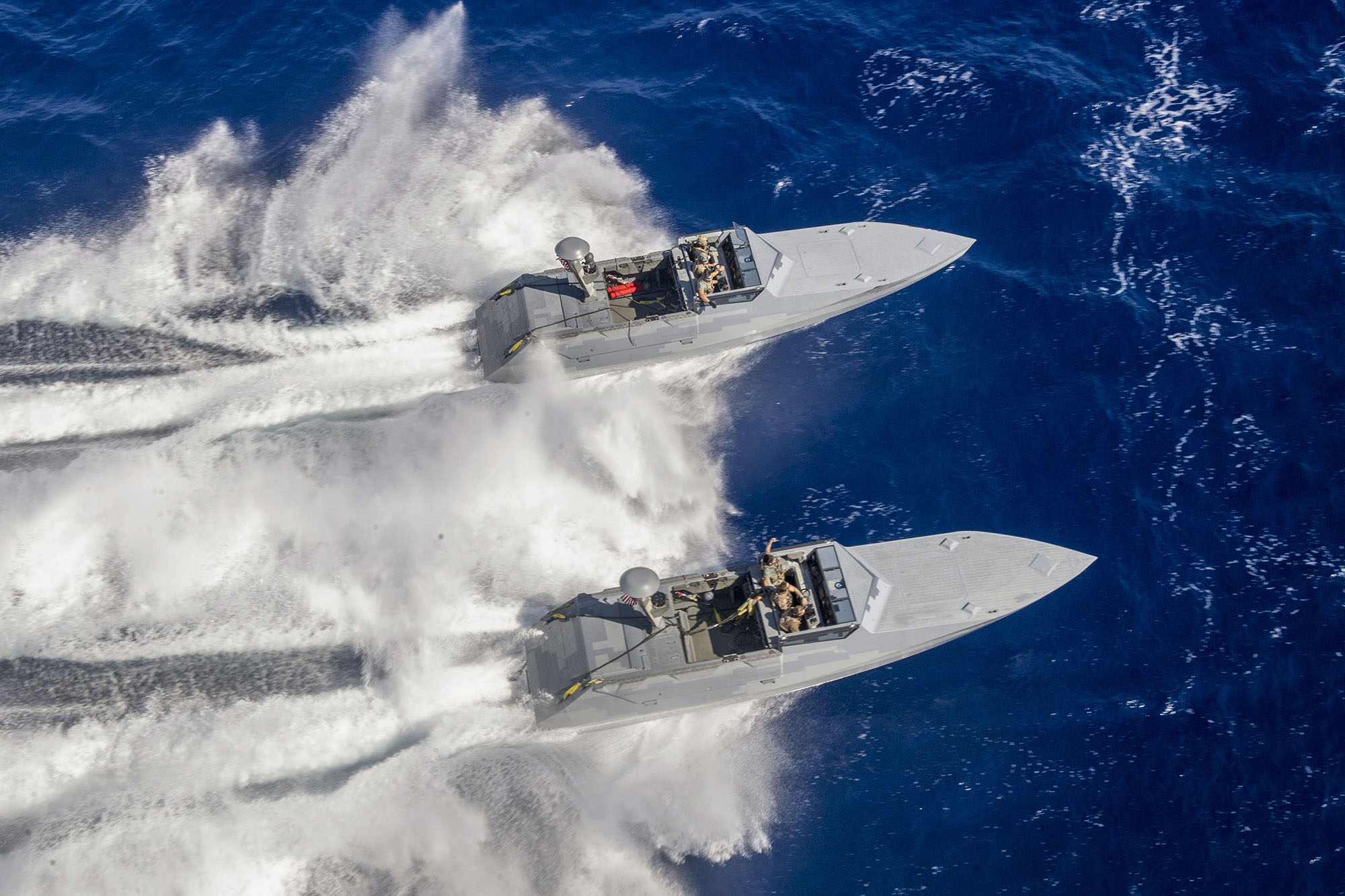 Sailors on combat craft assault (CCA) conduct small boat operations with the Expeditionary Sea Base USS Hershel