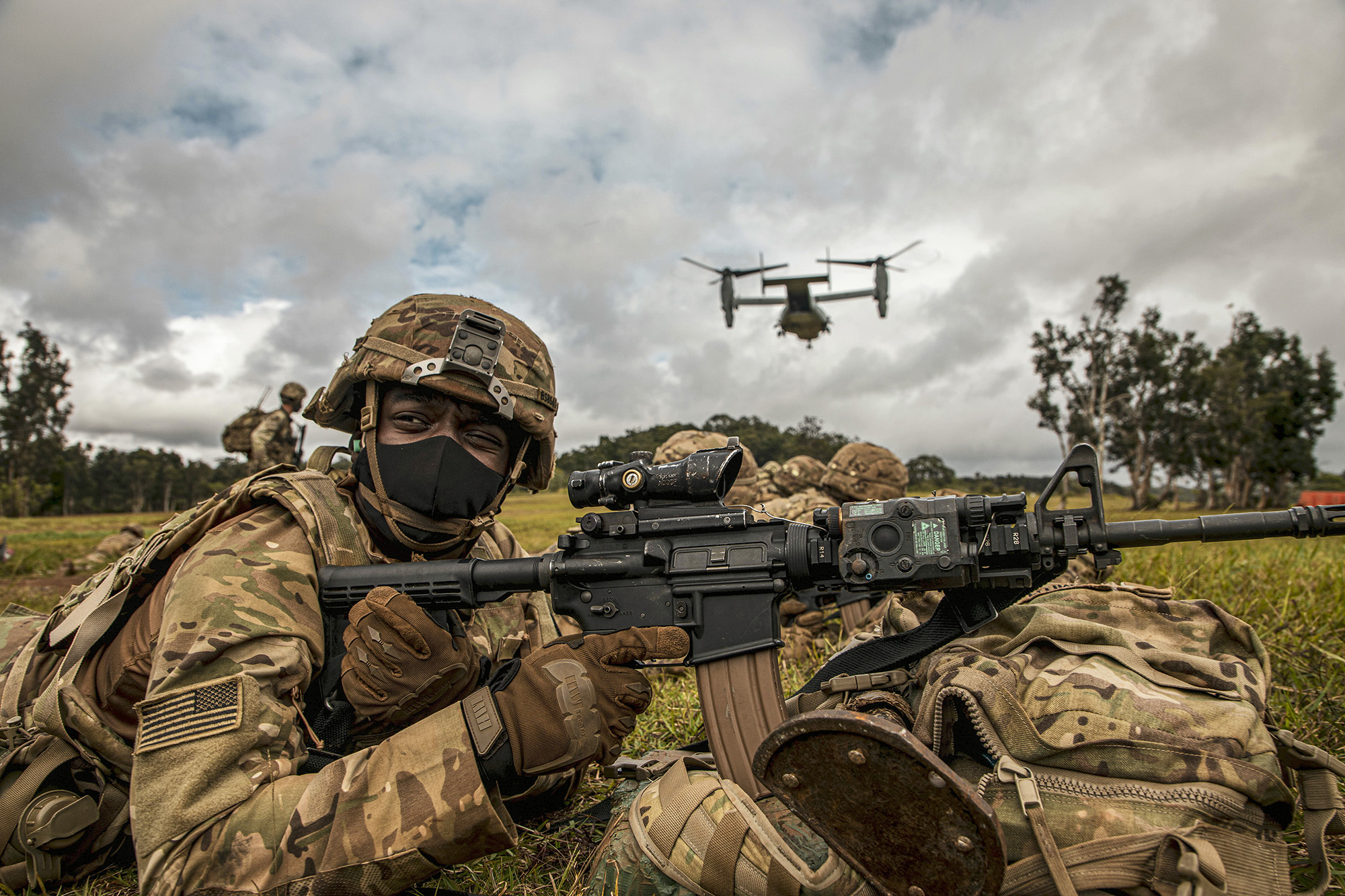 A service member participates in an exercise called Operation Wardog Kila for a joint live-fire exercise at Schofield Barracks, Hawaii, Dec. 30, 2020, with the 25th Combat Aviation Brigade, 25th Infantry Division Artillery units and the U.S. Marine Corps. (Sgt. Sarah D. Sangster/Army)