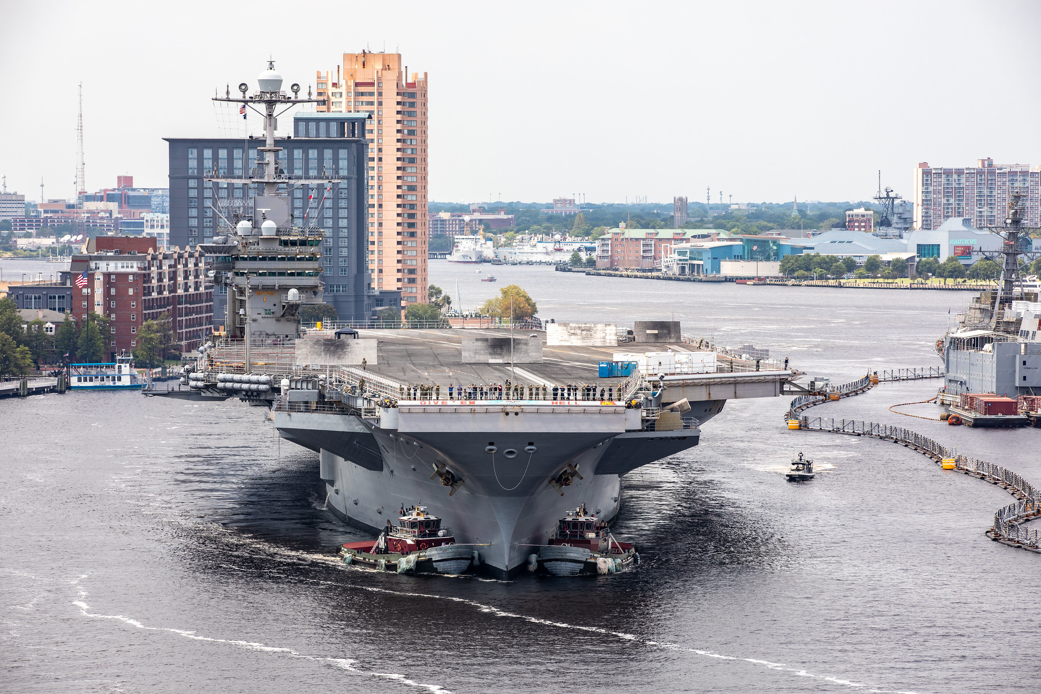 The aircraft carrier USS Harry S. Truman (CVN 75) arrives at Norfolk Naval Shipyard in Portsmouth, Va., July 7, 2020, for an extended carrier incremental availability. (Shelby West/Navy)
