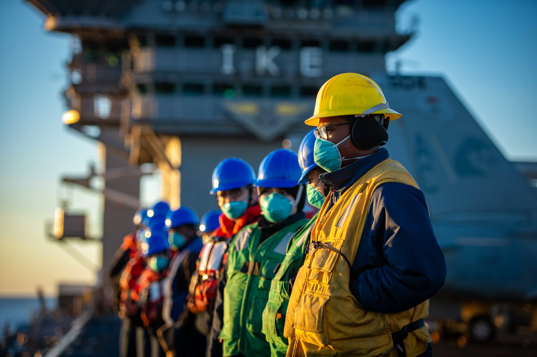 Sailors prepare for a replenishment-at-sea on Feb. 4, 2021, with the fleet-replenishment oiler USNS Kanawha (T-AO 196) onboard the Nimitz-class aircraft carrier USS Dwight D. Eisenhower (CVN 69) in the Atlantic Ocean. (Mass Communication Specialist Seaman Apprentice Mo Bourdi/Navy)