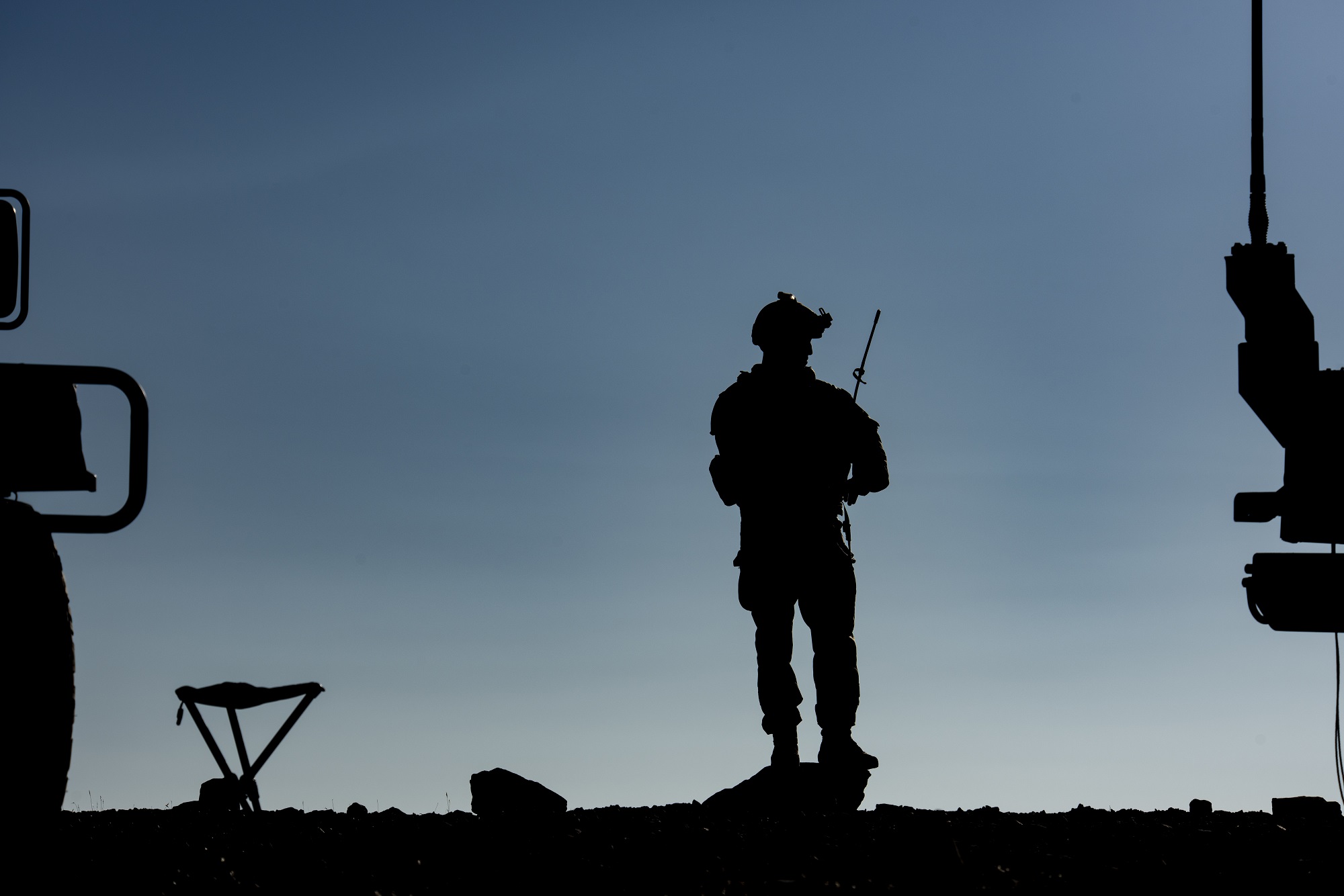 Staff Sgt. Raymond Flores, 12th Combat Training Squadron tactical air control party airman, talks on his radio during a Green Flag West 21-02 exercise, at Fort Irwin, Calif., Nov. 13, 2020. (Airman 1st Class Dwane R. Young/Air Force)