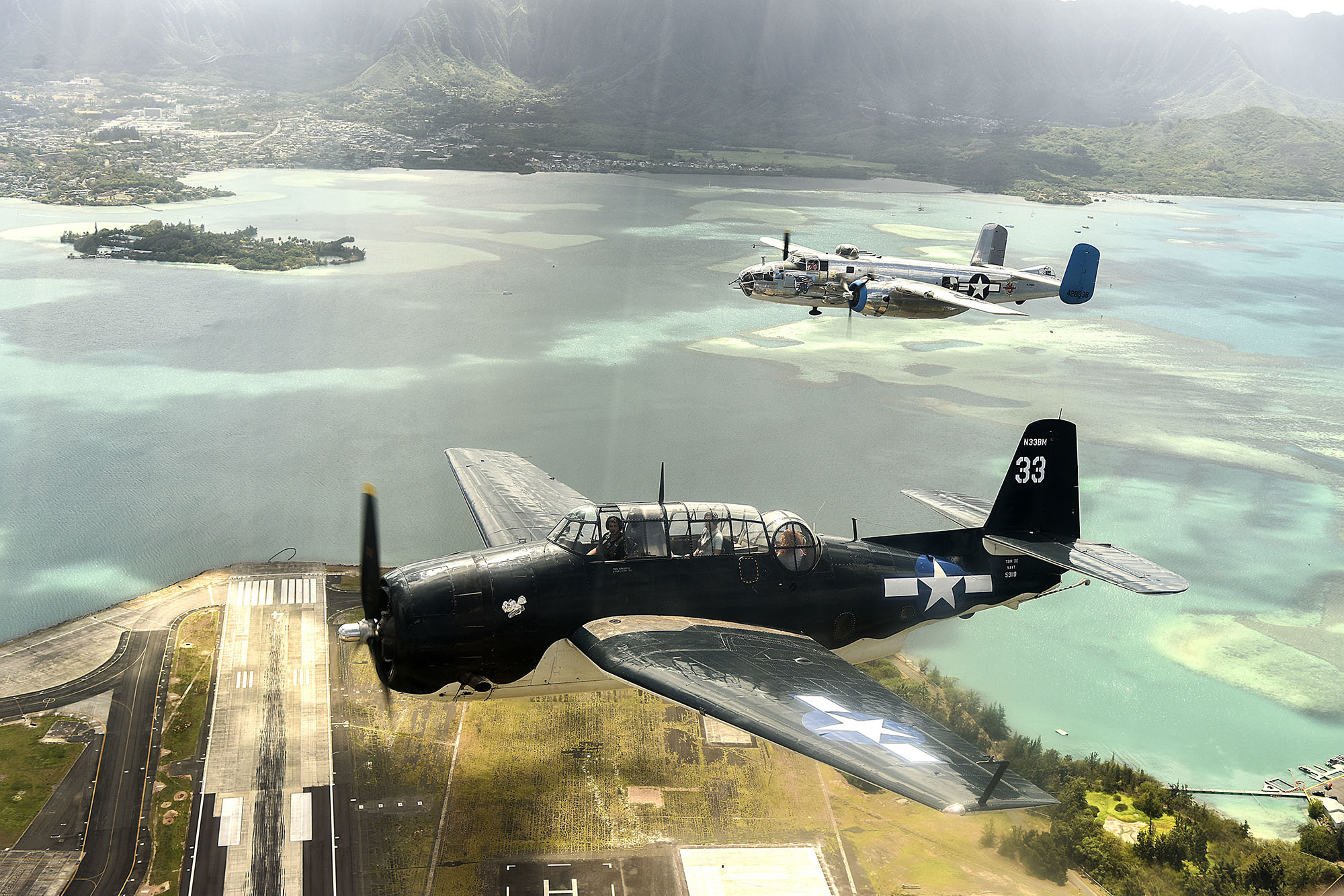 Vintage aircraft fly in formation over Oahu, Hawaii, on Sept. 1, 2020, for the 75th commemoration of the end of WWII. (Tech. Sgt. Anthony Nelson Jr./Air Force)